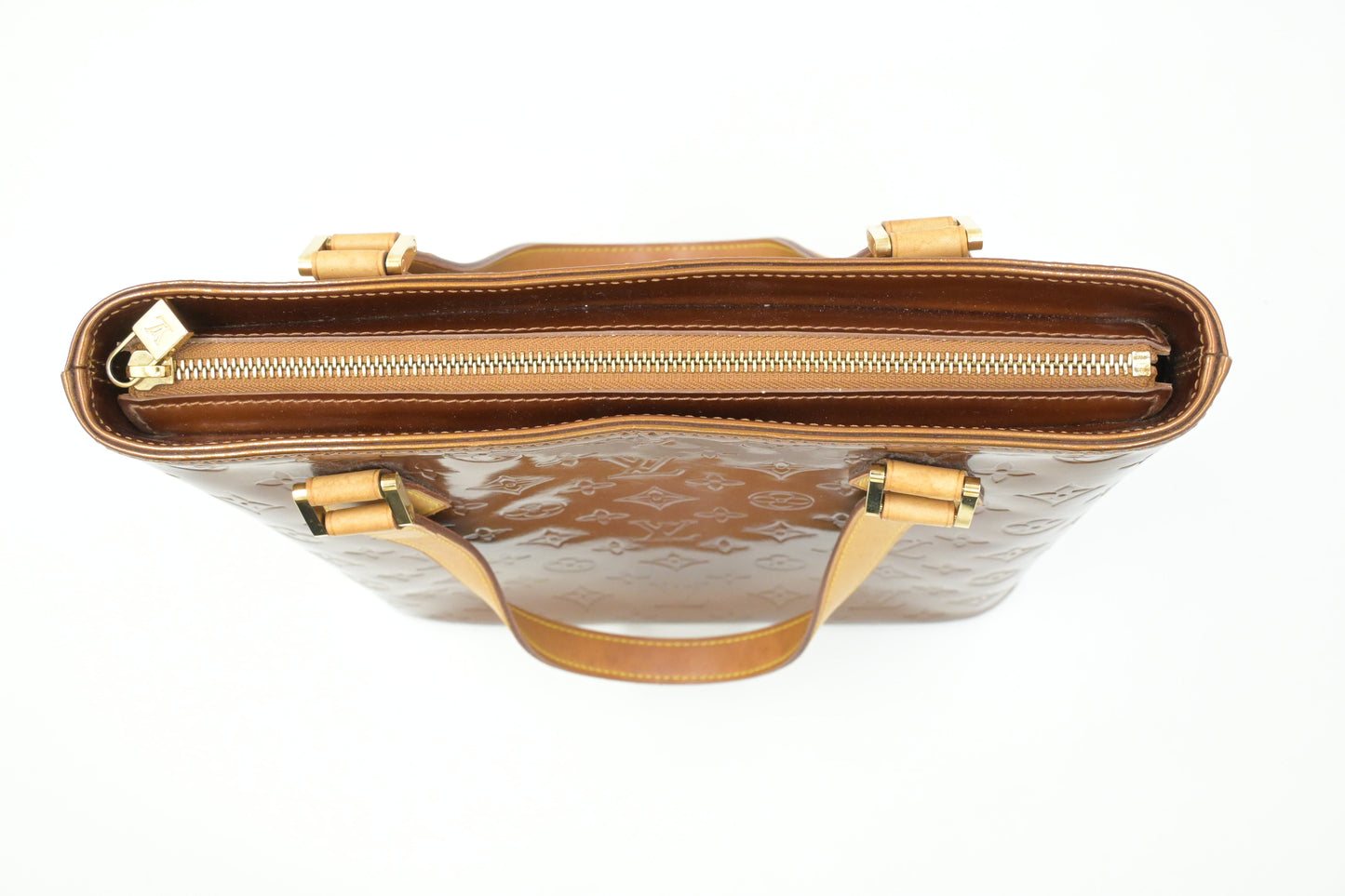 Louis Vuitton Houston in Bronze Vernis Leather