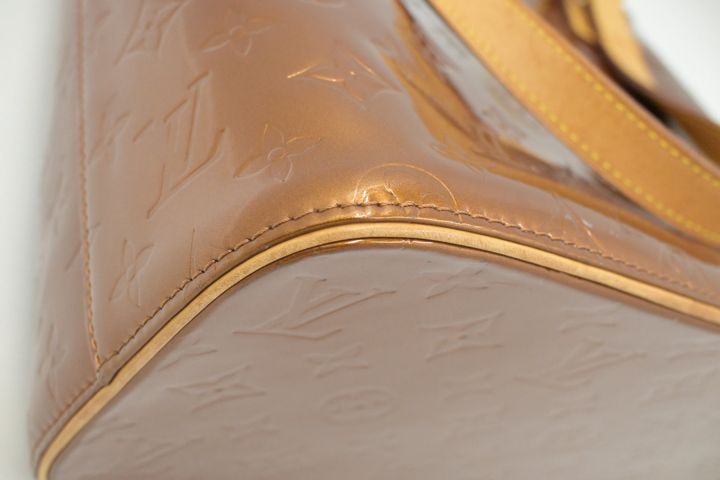 Louis Vuitton Houston in Bronze Vernis Leather