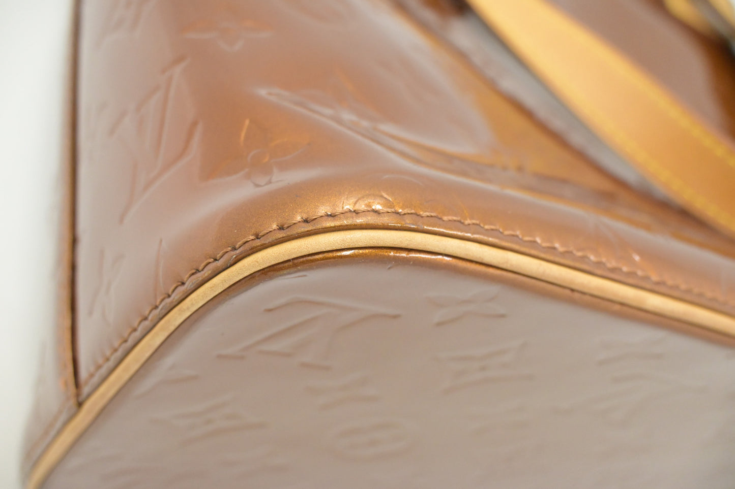 Louis Vuitton Houston in Bronze Vernis Leather