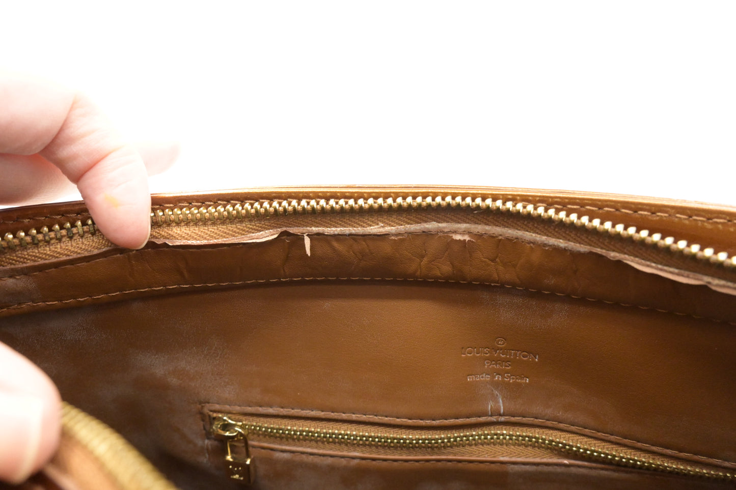 Louis Vuitton Houston in Bronze Vernis Leather