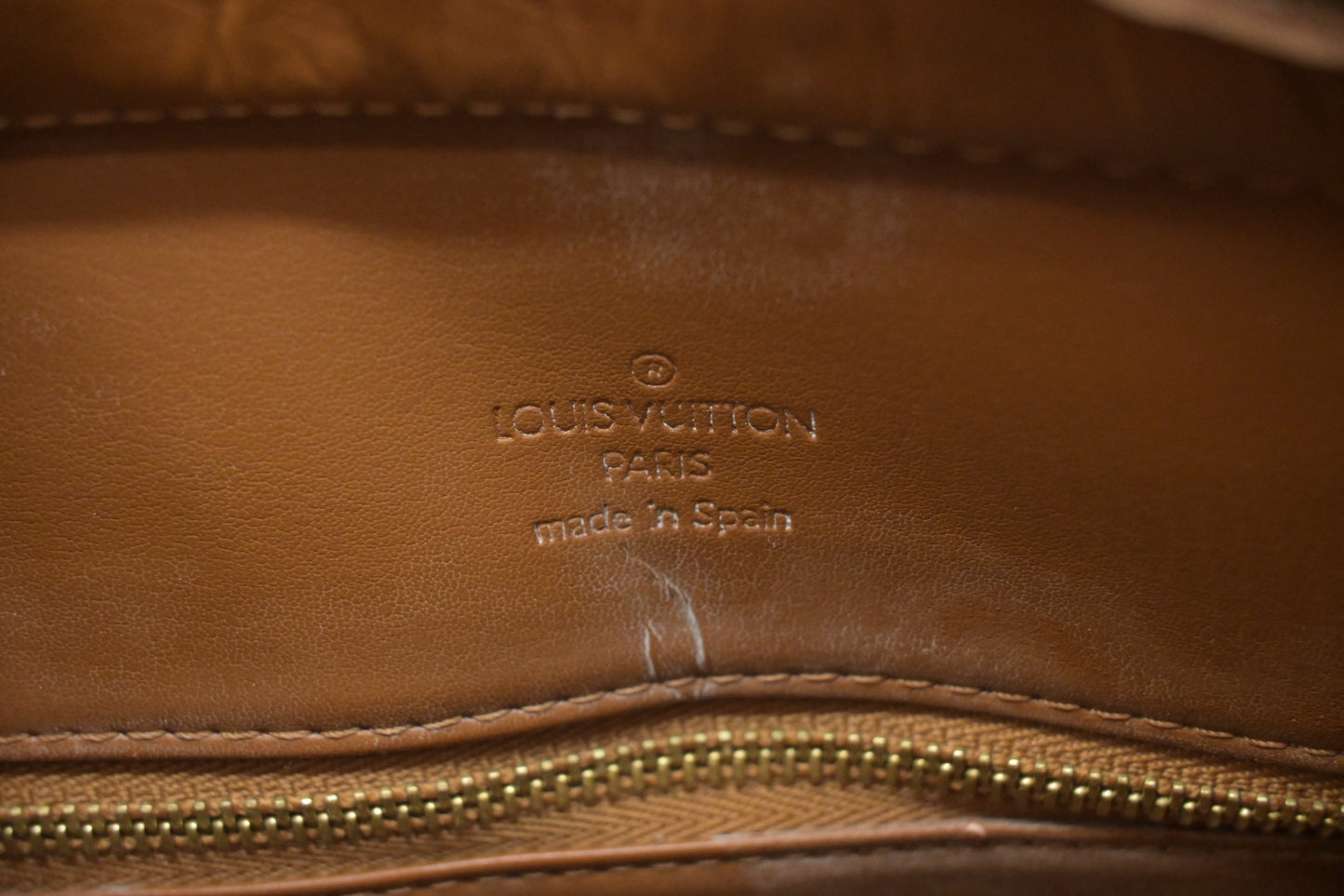 Louis Vuitton Houston in Bronze Vernis Leather