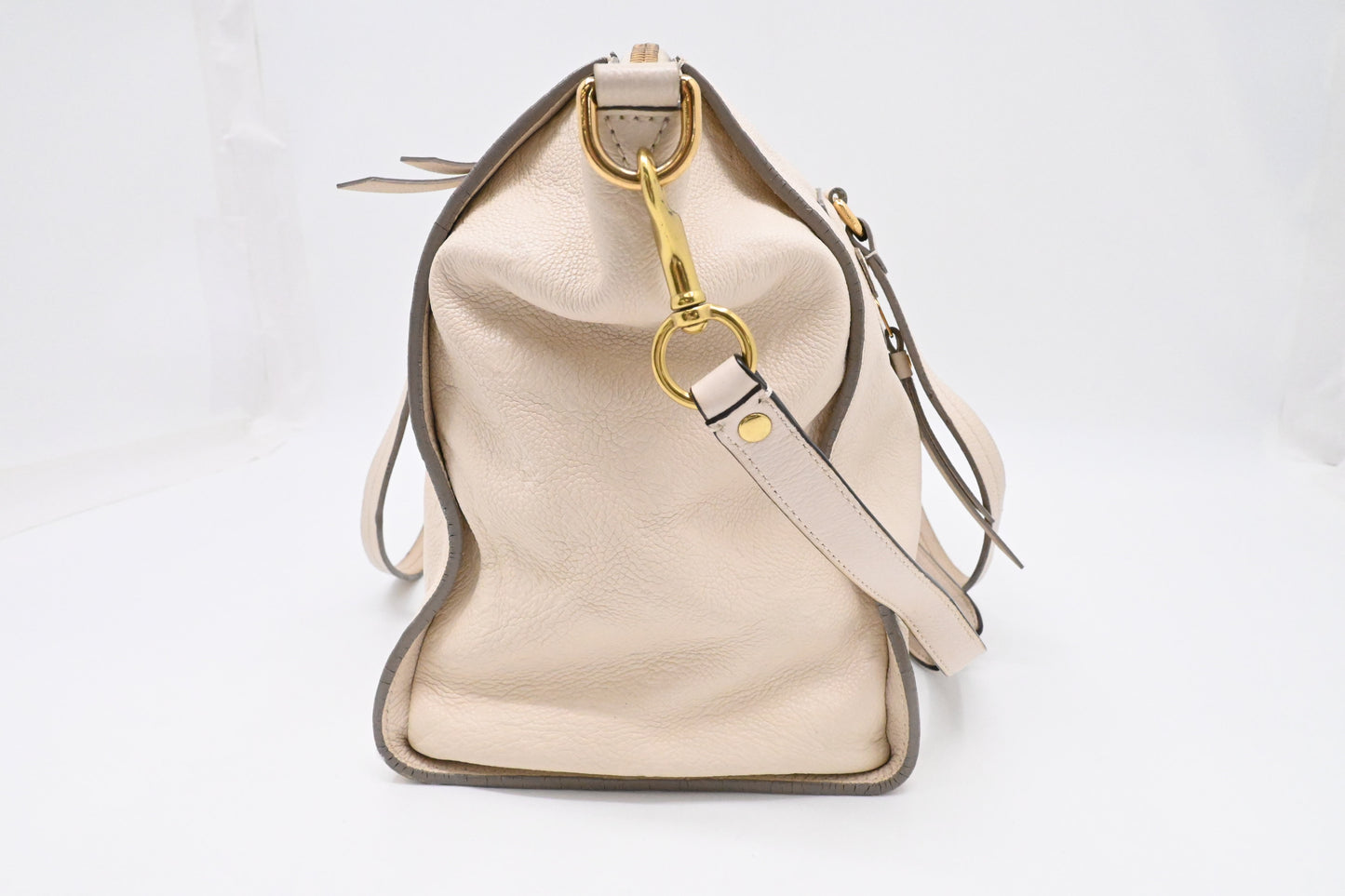 Louis Vuitton Lumineuse PM in Cream Empreinte Leather