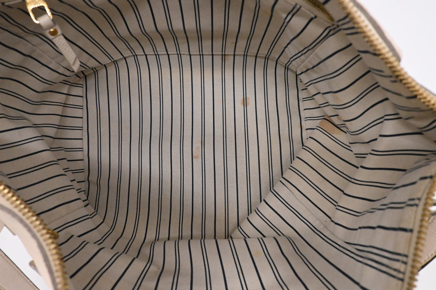 Louis Vuitton Lumineuse PM in Cream Empreinte Leather