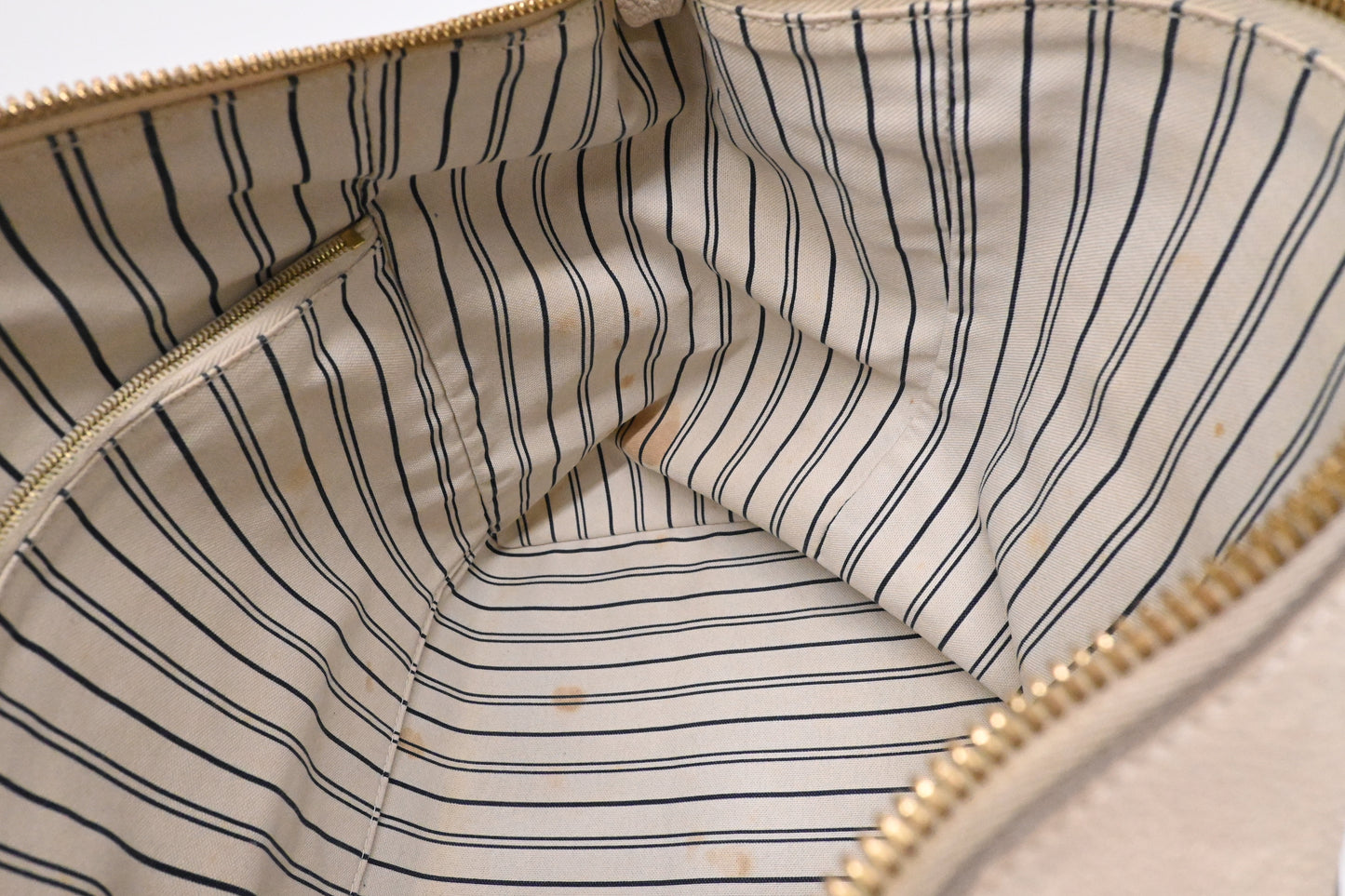 Louis Vuitton Lumineuse PM in Cream Empreinte Leather