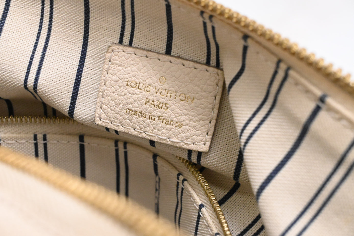 Louis Vuitton Lumineuse PM in Cream Empreinte Leather