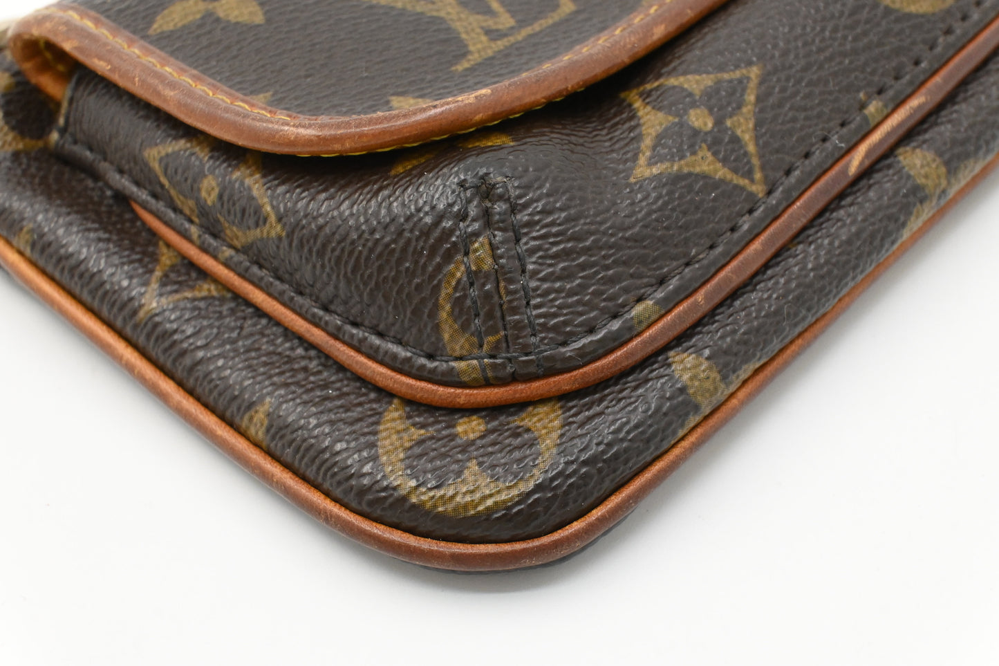 Louis Vuitton Tikal Pochette in Monogram Canvas