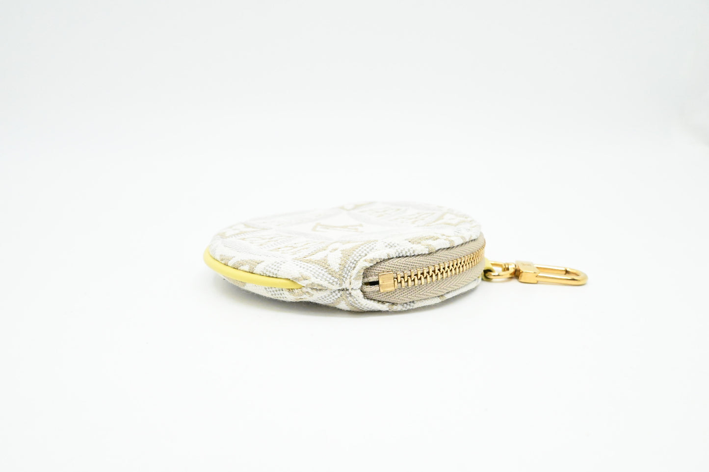 Louis Vuitton Porte Monnaie Round Coin Case in White Since 1854 Jacquard Canvas