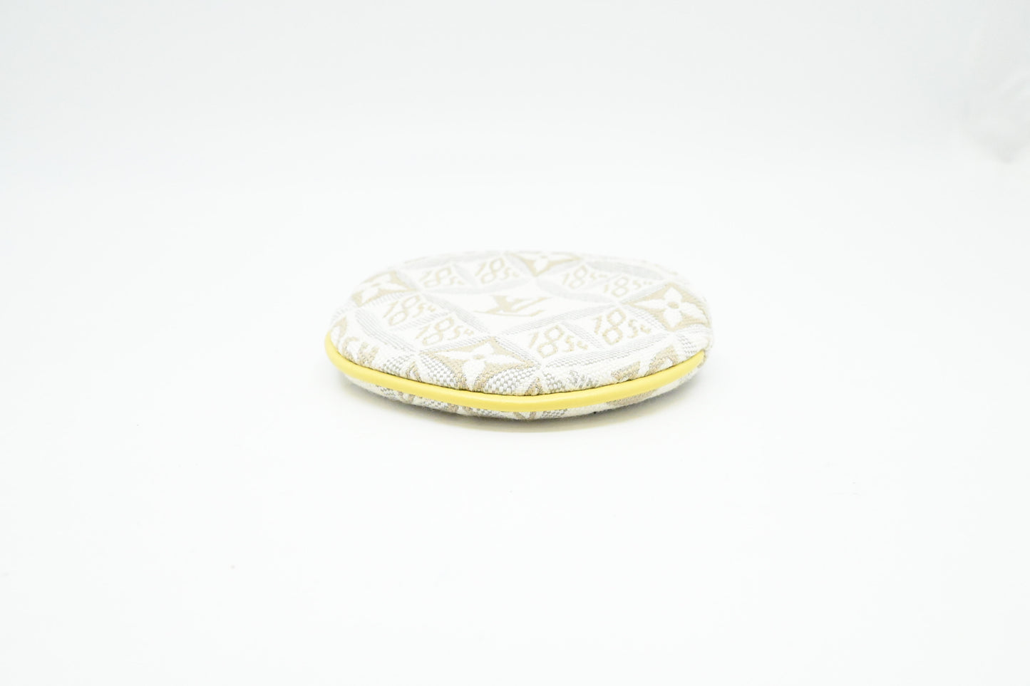 Louis Vuitton Porte Monnaie Round Coin Case in White Since 1854 Jacquard Canvas