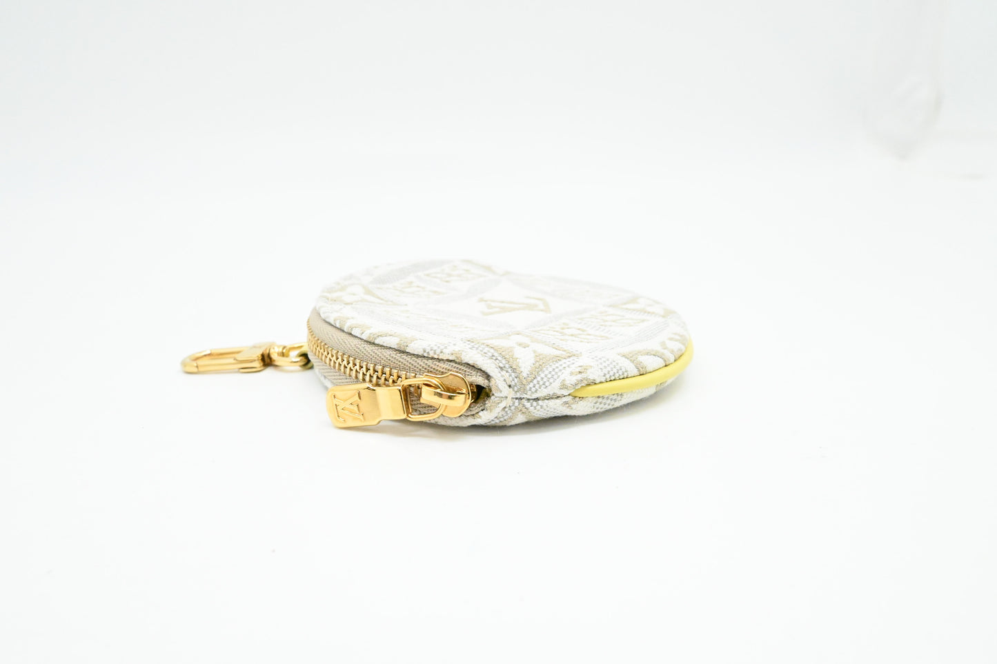 Louis Vuitton Porte Monnaie Round Coin Case in White Since 1854 Jacquard Canvas