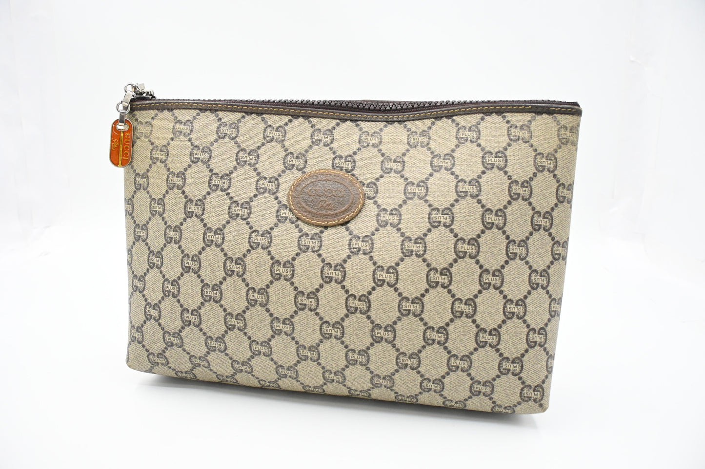 Gucci Plus Clutch in GG Plus Supreme Canvas