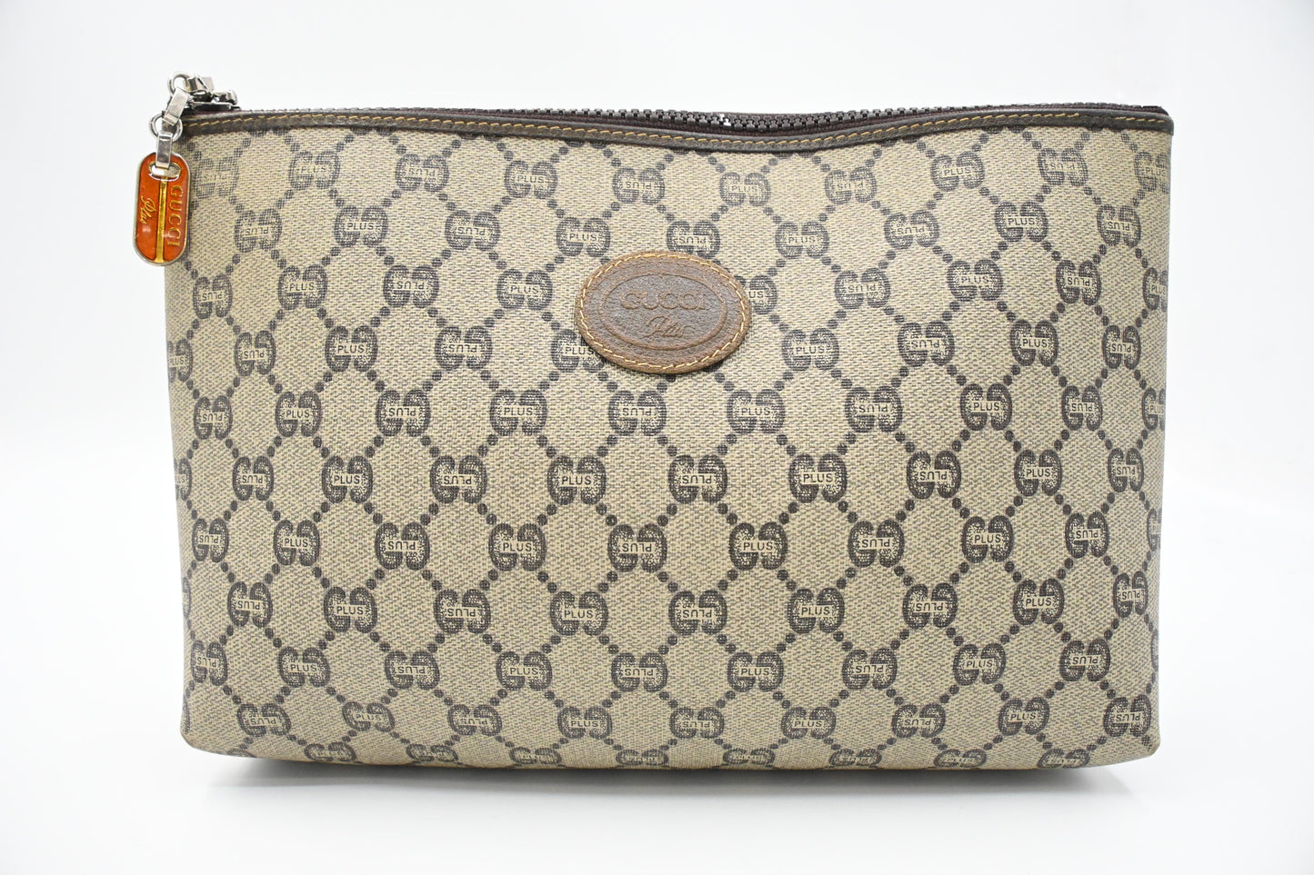 Gucci Plus Clutch in GG Plus Supreme Canvas