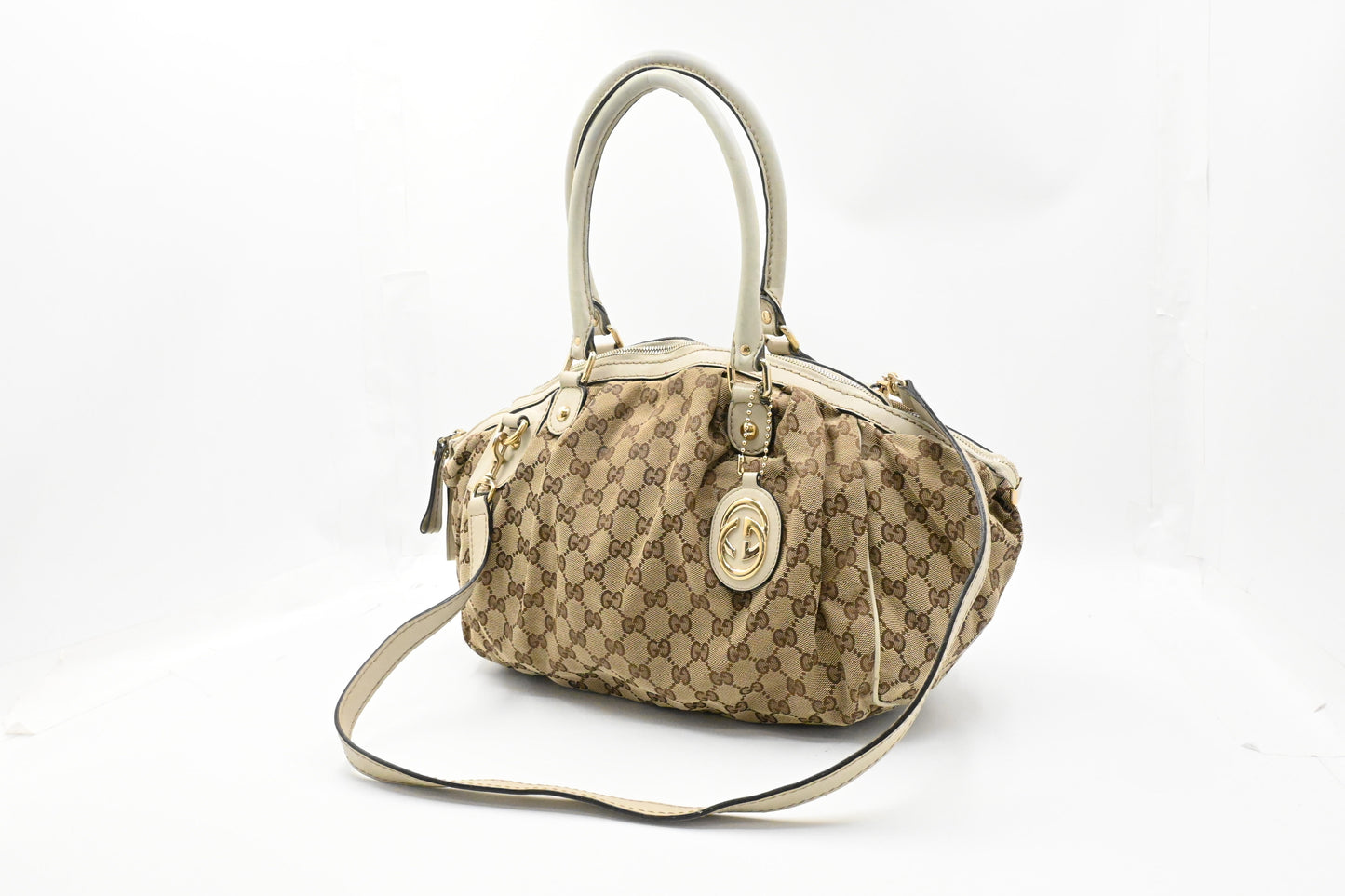 Gucci Sukey in GG Canvas and Cream Leather