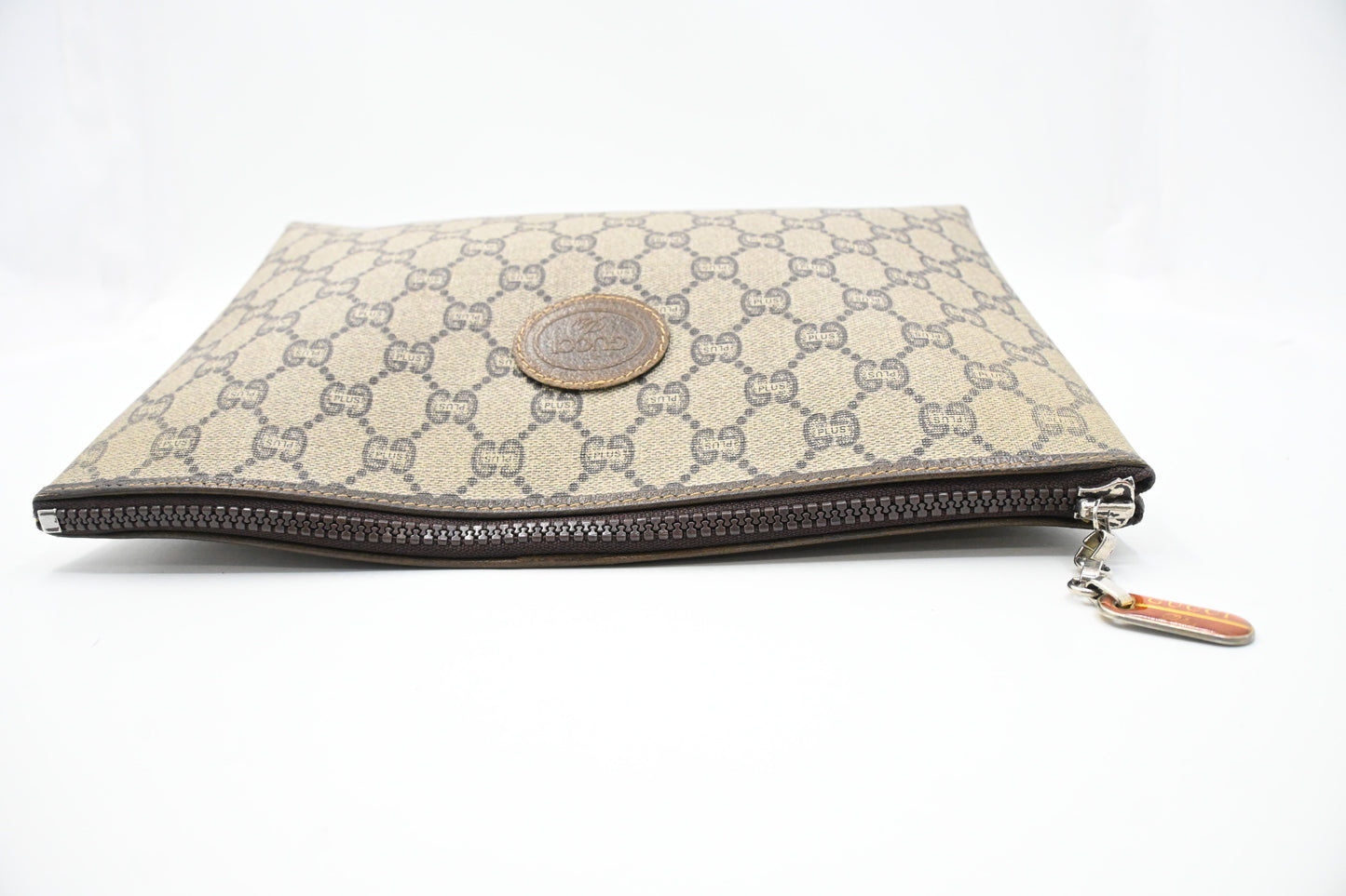 Gucci Plus Clutch in GG Plus Supreme Canvas