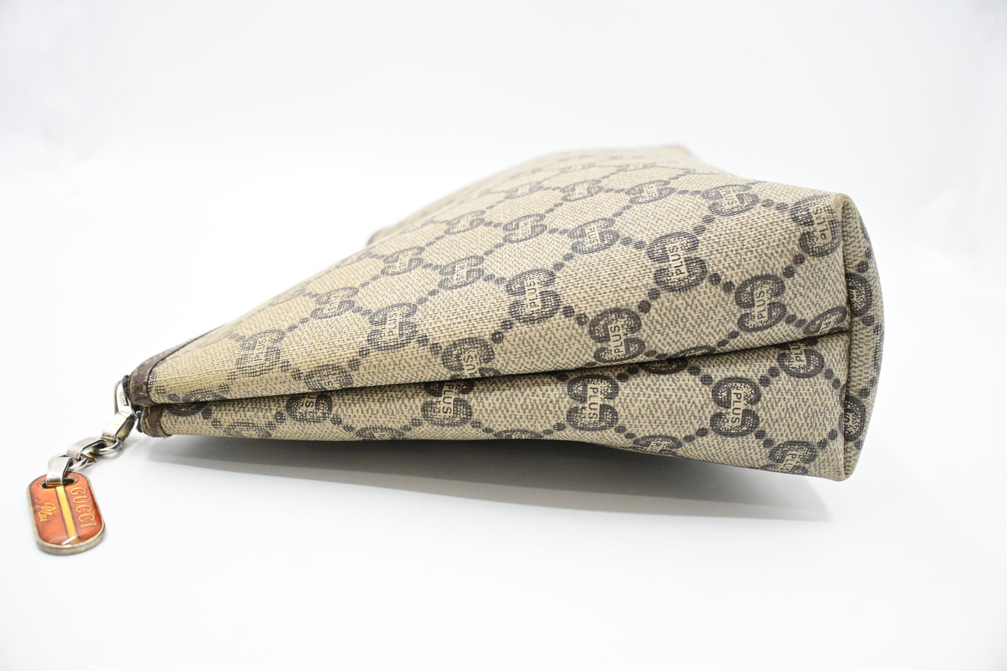 Gucci Plus Clutch in GG Plus Supreme Canvas