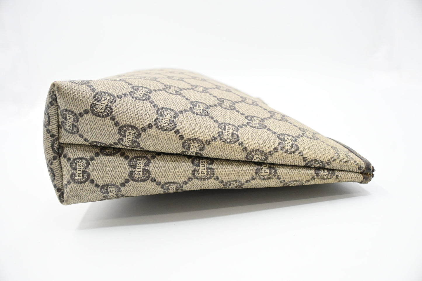 Gucci Plus Clutch in GG Plus Supreme Canvas