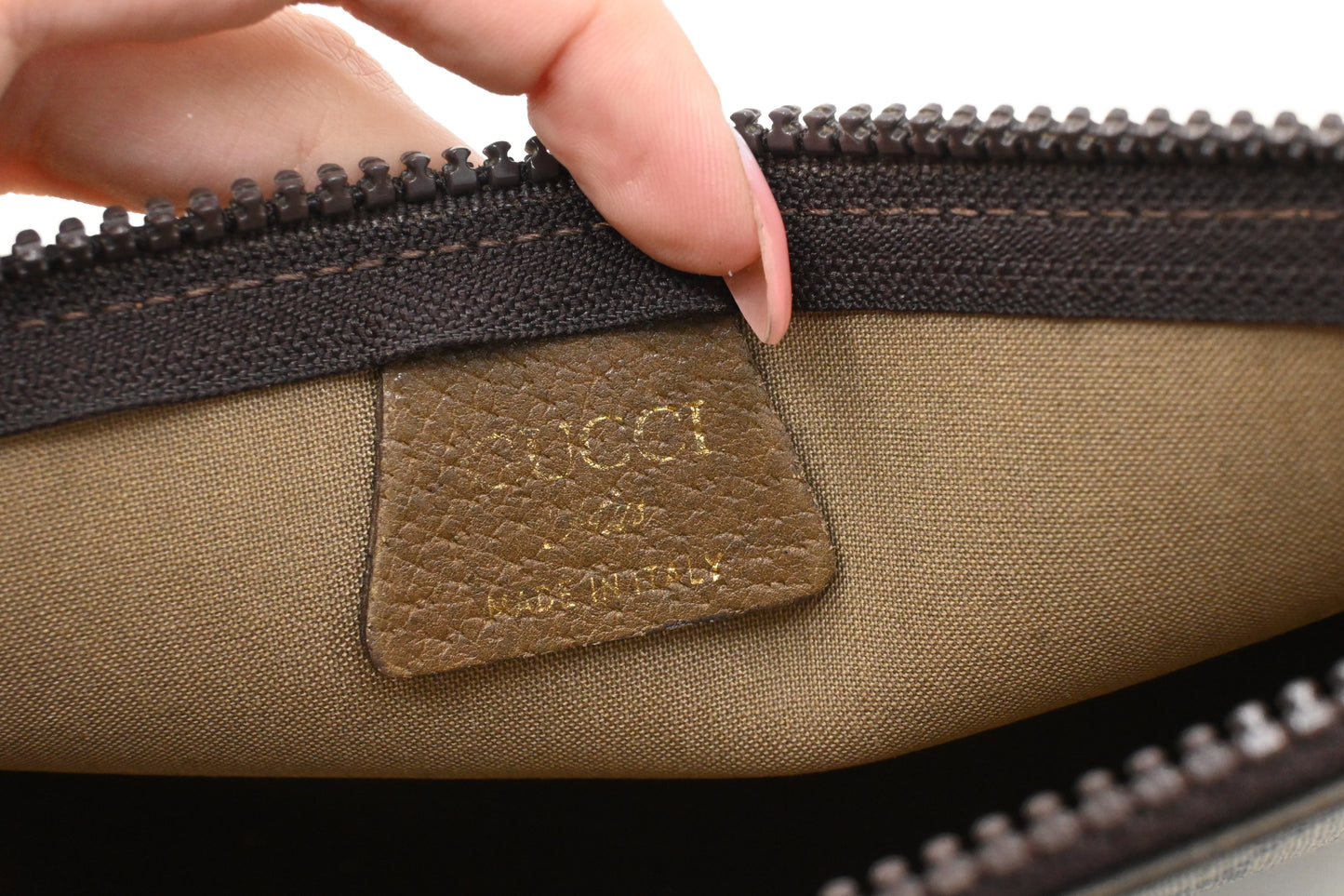 Gucci Plus Clutch in GG Plus Supreme Canvas