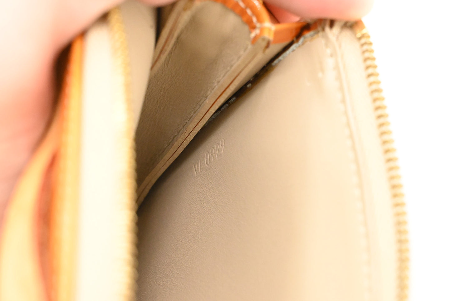Louis Vuitton Lexington in Mango Vernis Leather