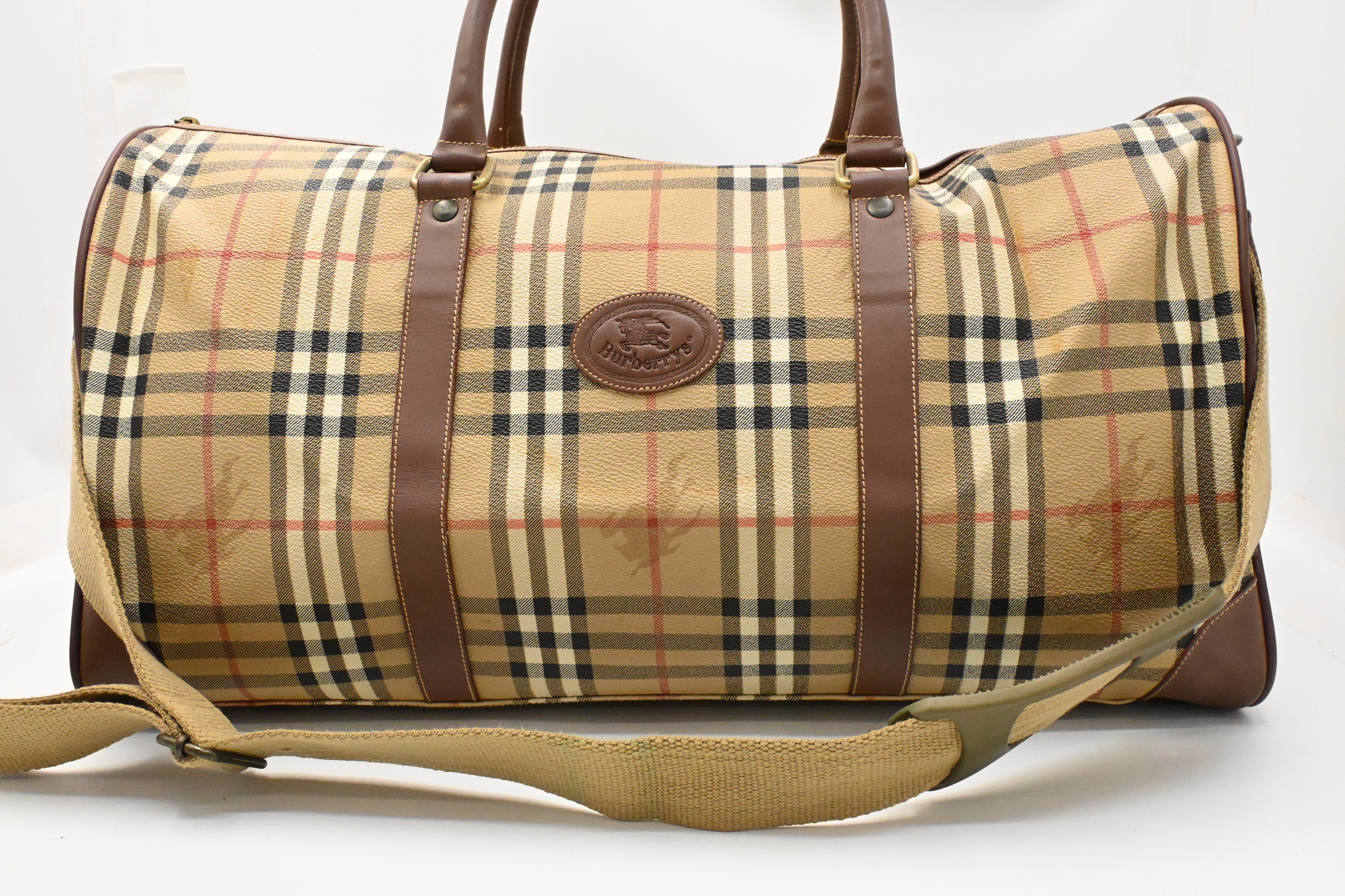Burberry Duffle Bag in Beige Checked Coated Canvas – Weekly Lux Drop