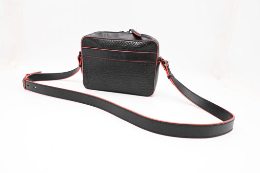Ferragamo Embossed Gancini Crossbody in Black Leather