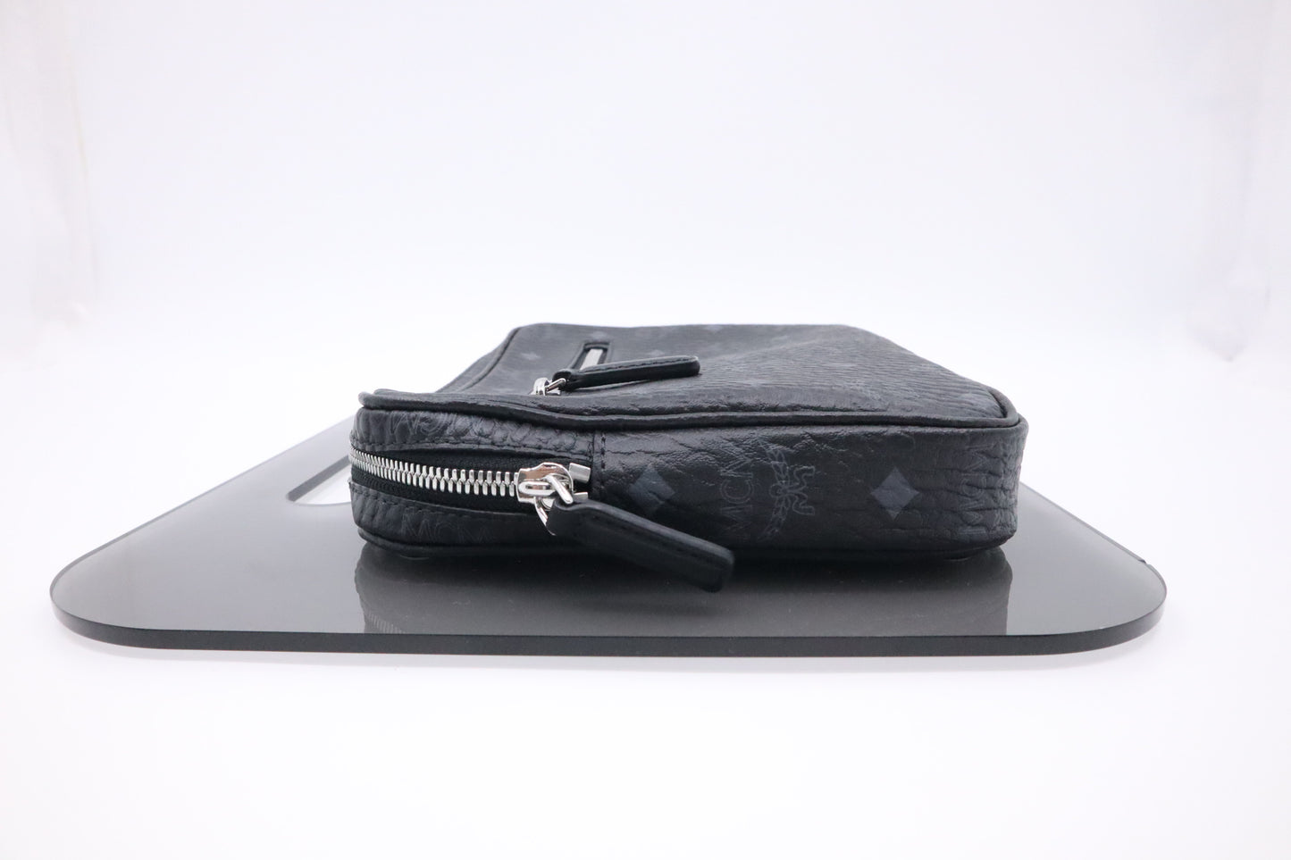 MCM x Phenomenon Clutch in Black Visetos Canvas