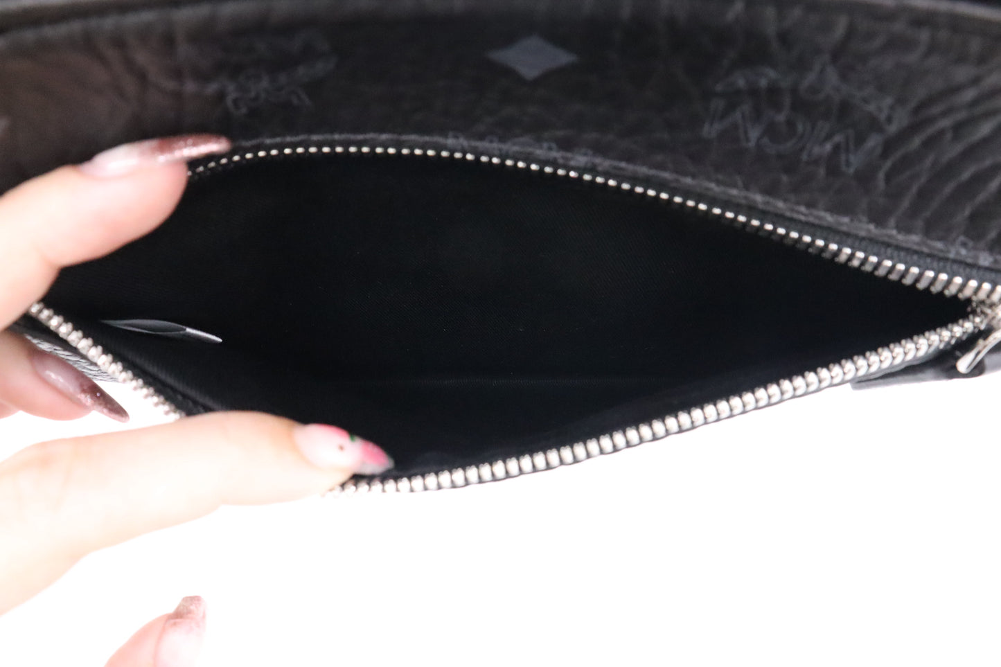 MCM x Phenomenon Clutch in Black Visetos Canvas
