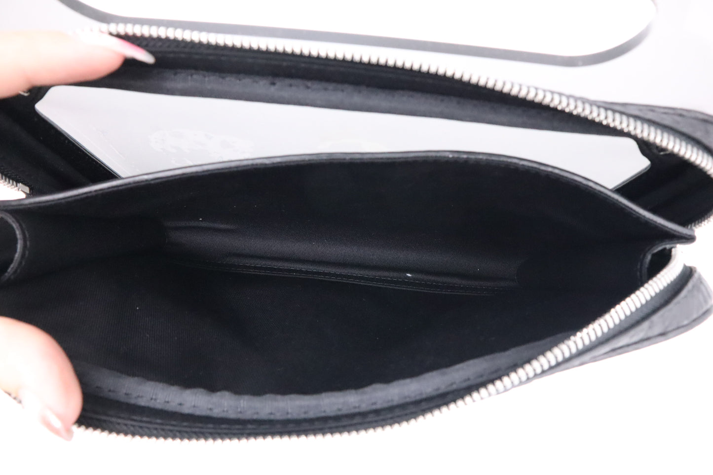 MCM x Phenomenon Clutch in Black Visetos Canvas