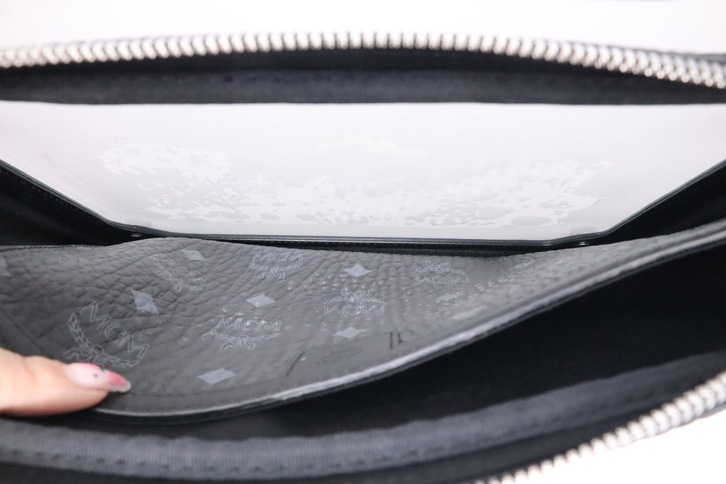 MCM x Phenomenon Clutch in Black Visetos Canvas