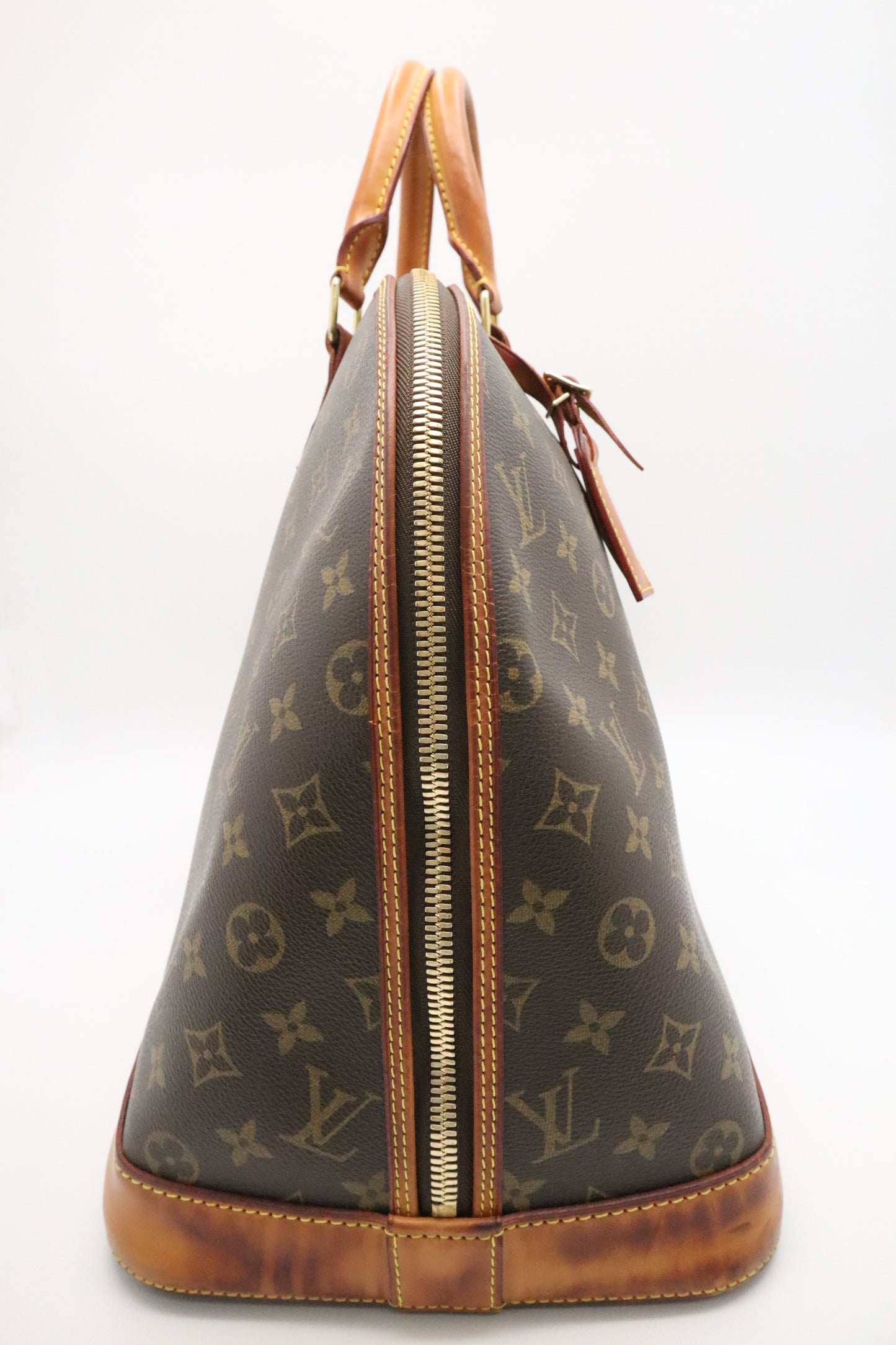 Louis Vuitton Alma Voyage GM in Monogram Canvas