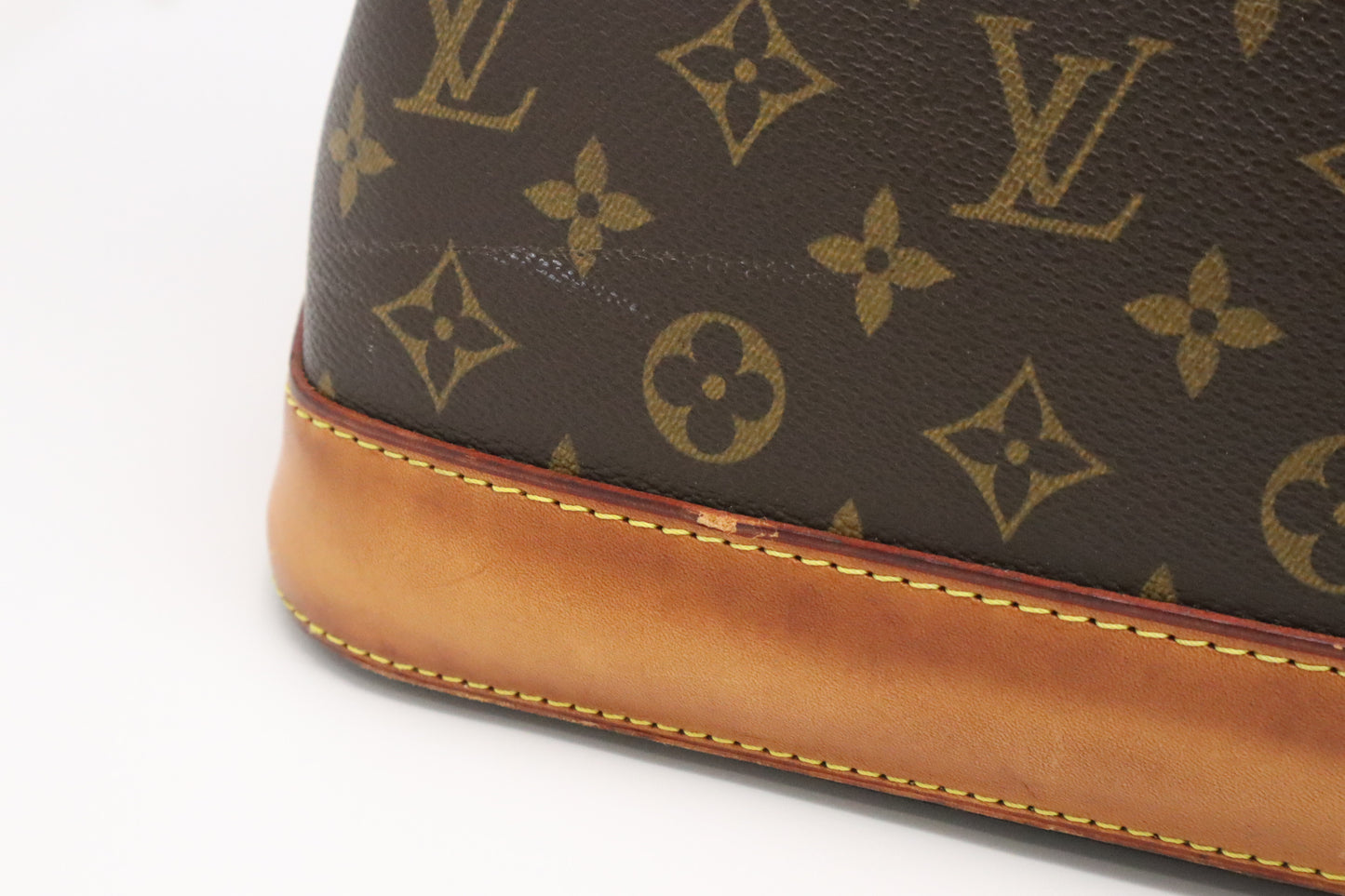 Louis Vuitton Alma Voyage GM in Monogram Canvas