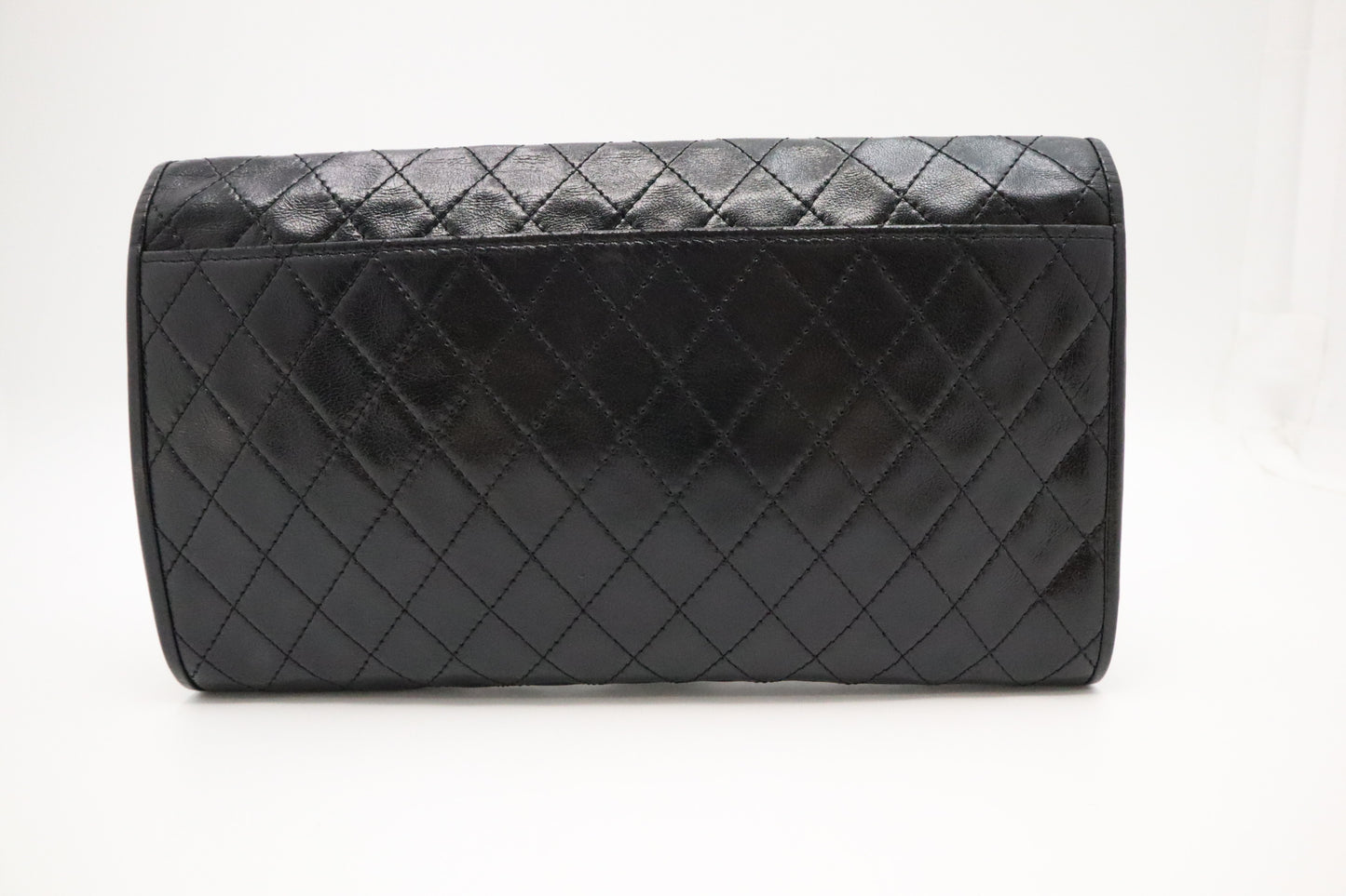 YSL Saint Laurent Clutch in Black Quilted Leather