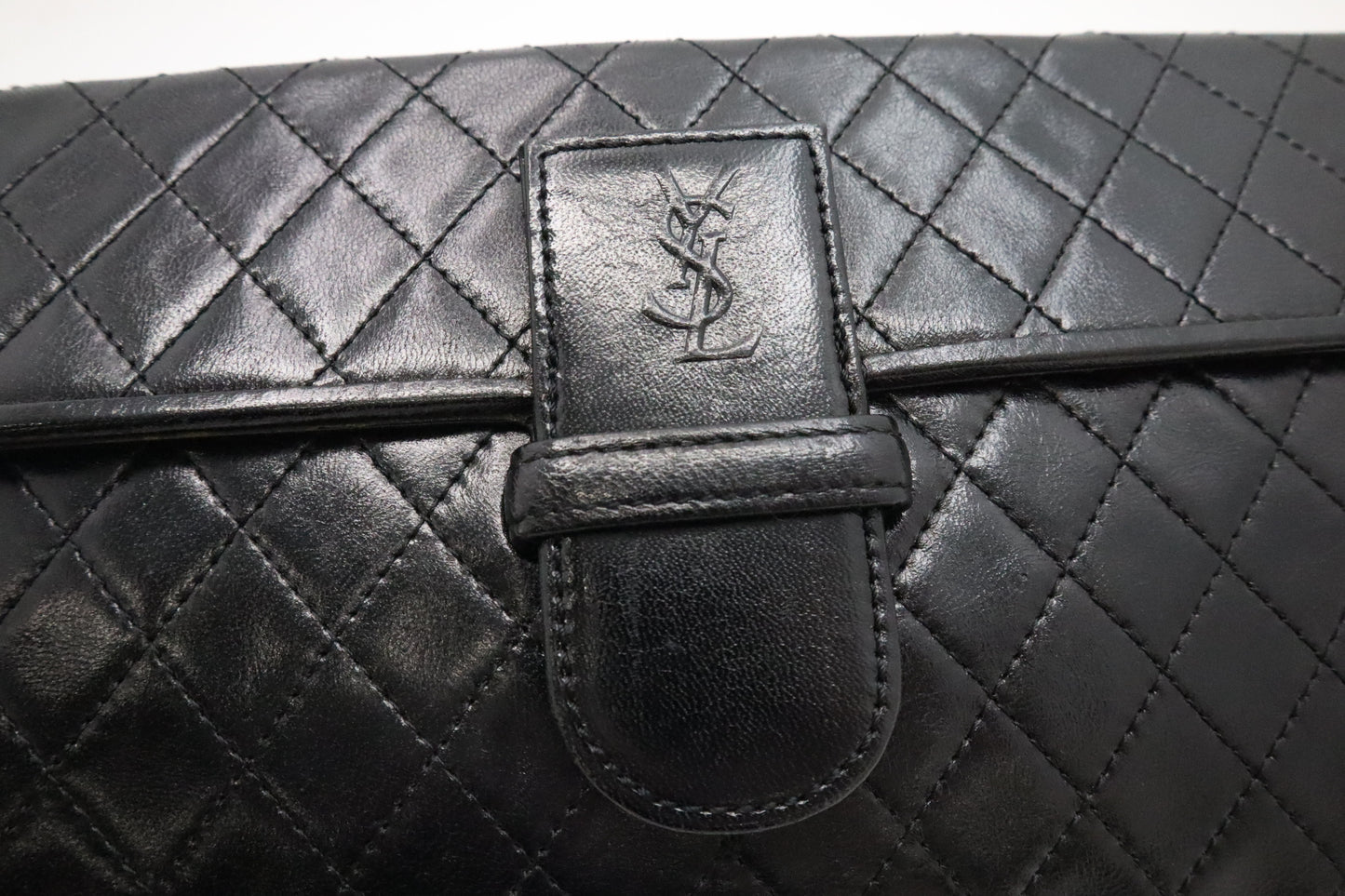 YSL Saint Laurent Clutch in Black Quilted Leather