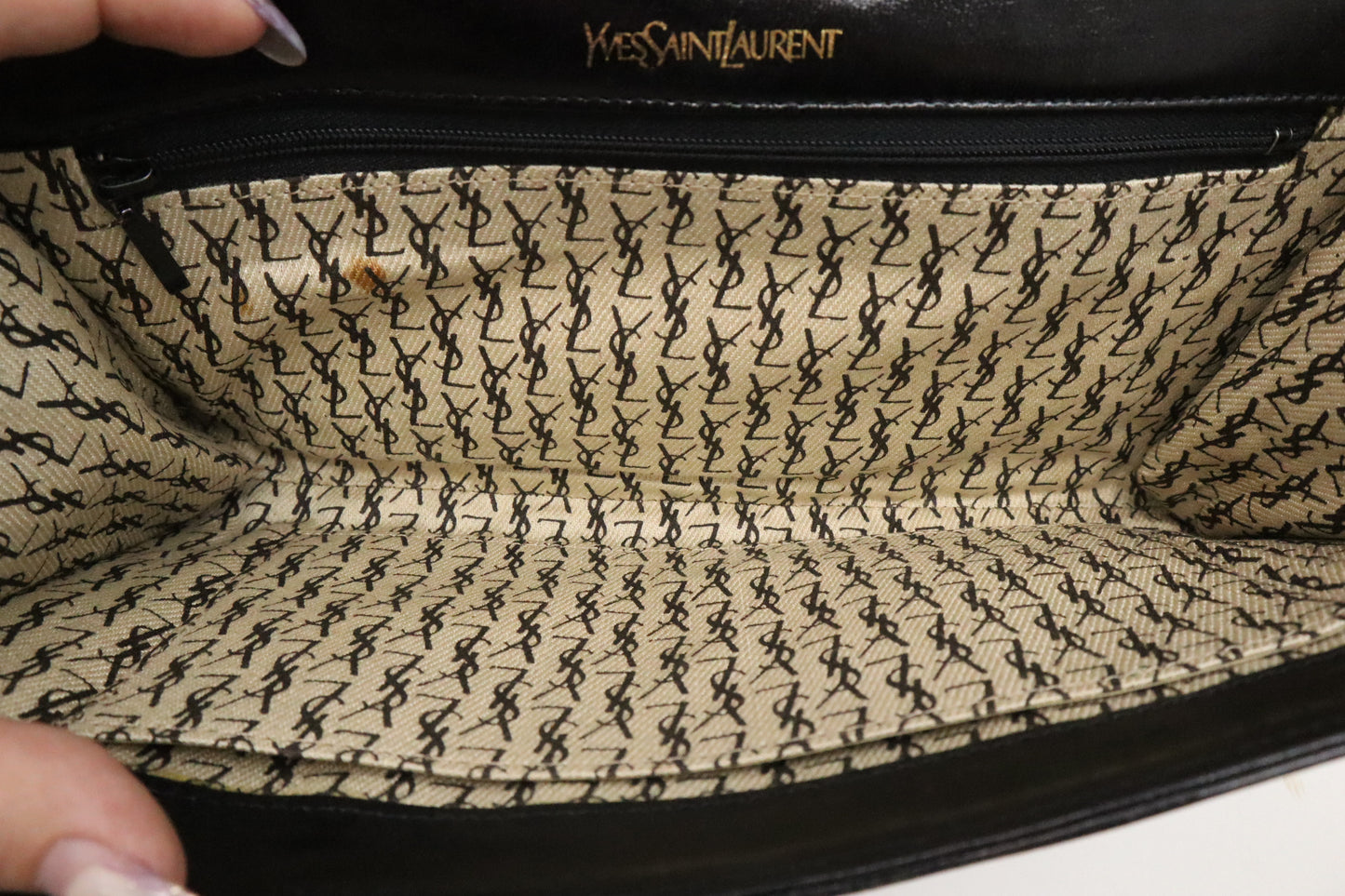 YSL Saint Laurent Clutch in Black Quilted Leather