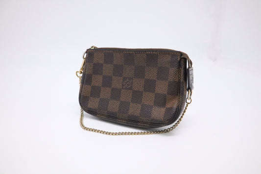 Louis Vuitton Mini Pochette Accessoires in Damier Ebene Canvas