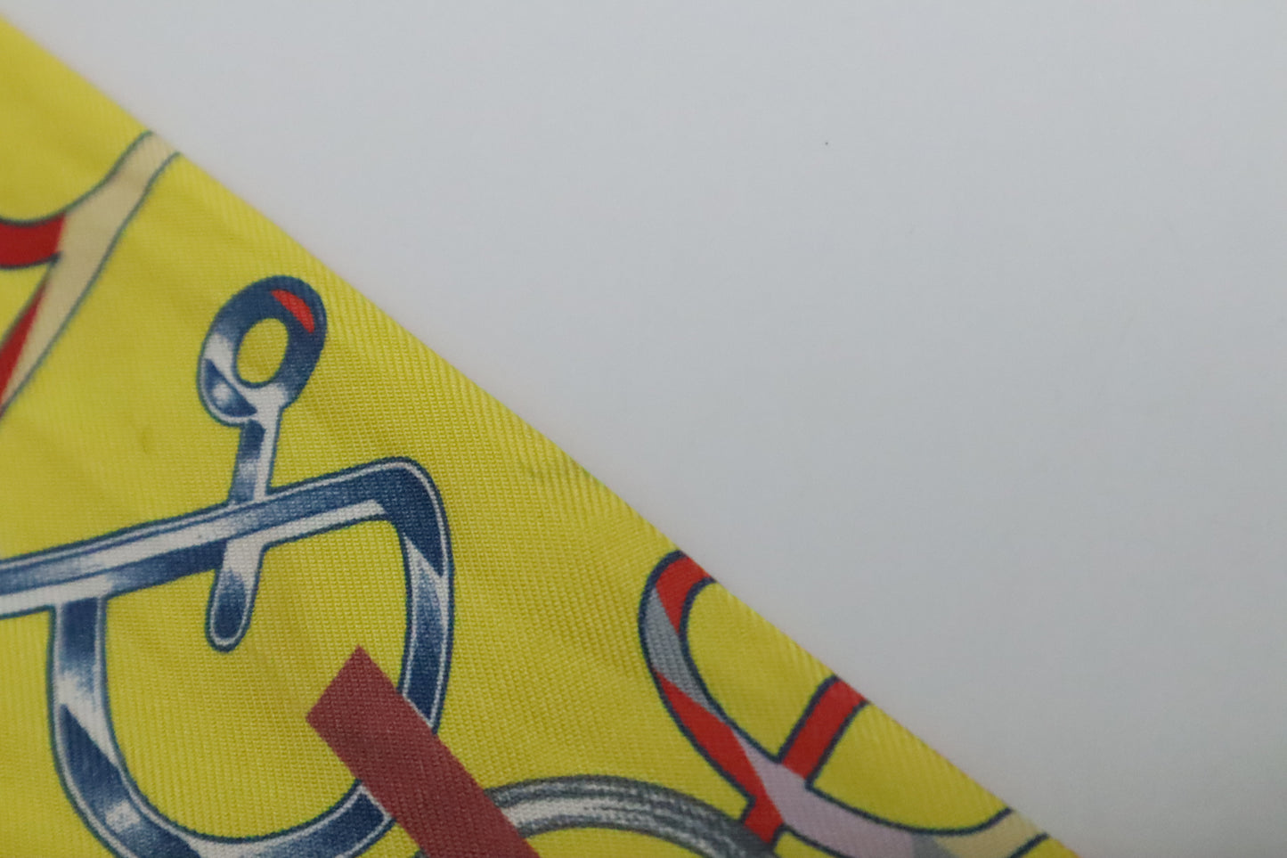 Hermes Twilly 'Do Re Boucles' in Orange & Yellow Silk