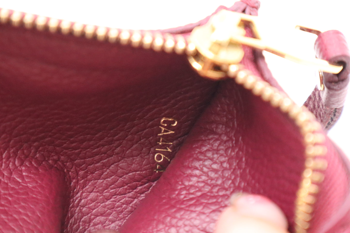 Louis Vuitton Sarah Wallet in Aurore Empreinte Leather