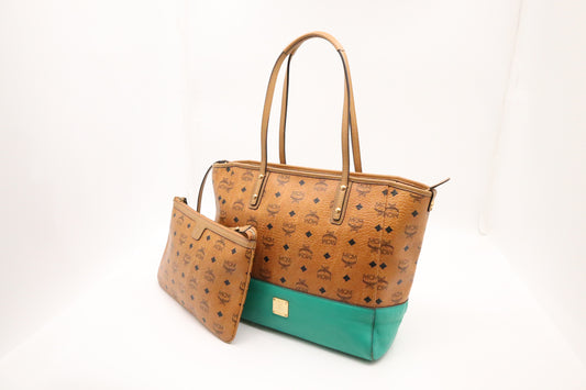 MCM Shopper Tote in Cognac Visetos Canvas and Turquoise Leather
