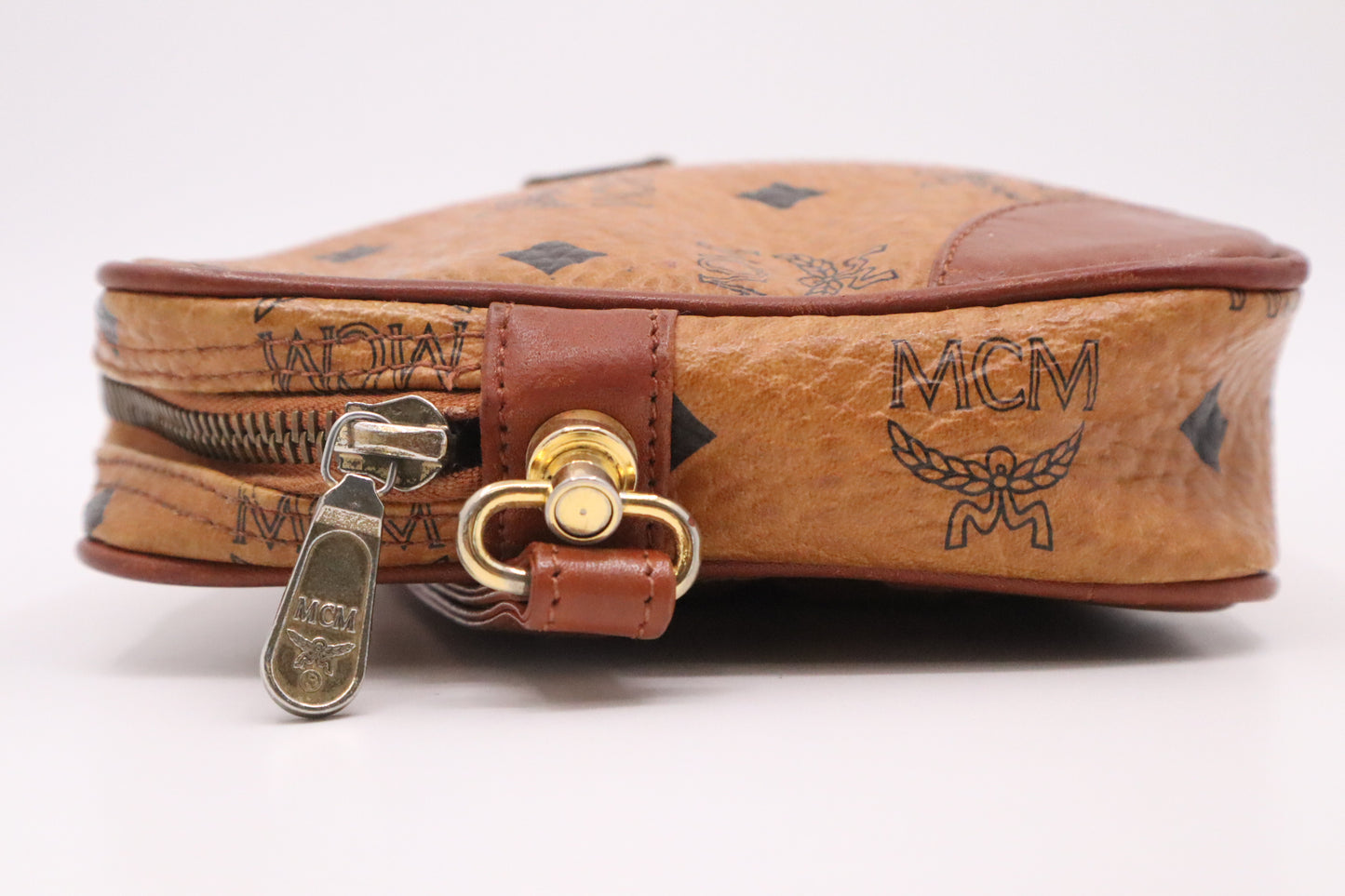 MCM Clutch in Cognac Visetos Canvas