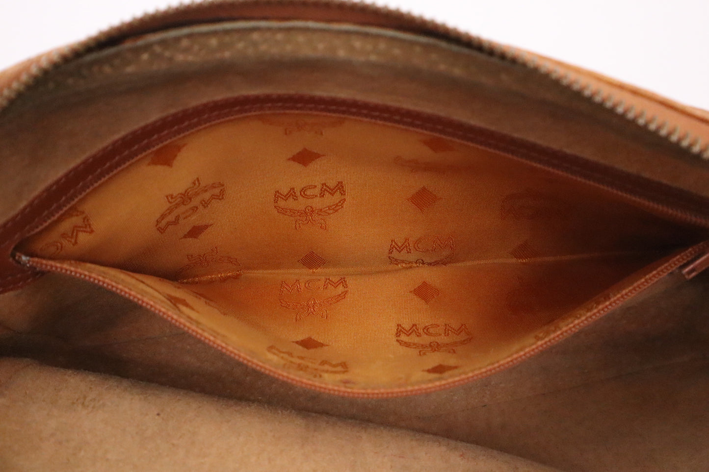 MCM Clutch in Cognac Visetos Canvas