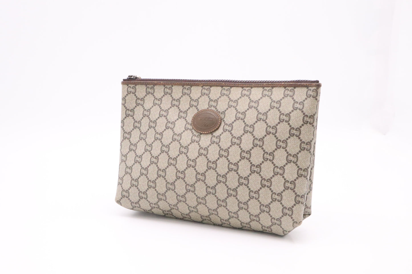 Gucci Plus Clutch in GG Supreme Canvas
