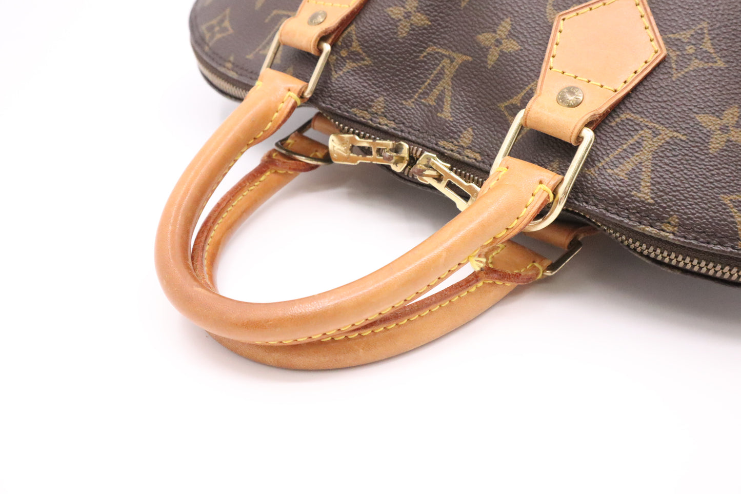 Louis Vuitton Alma PM in Monogram Canvas
