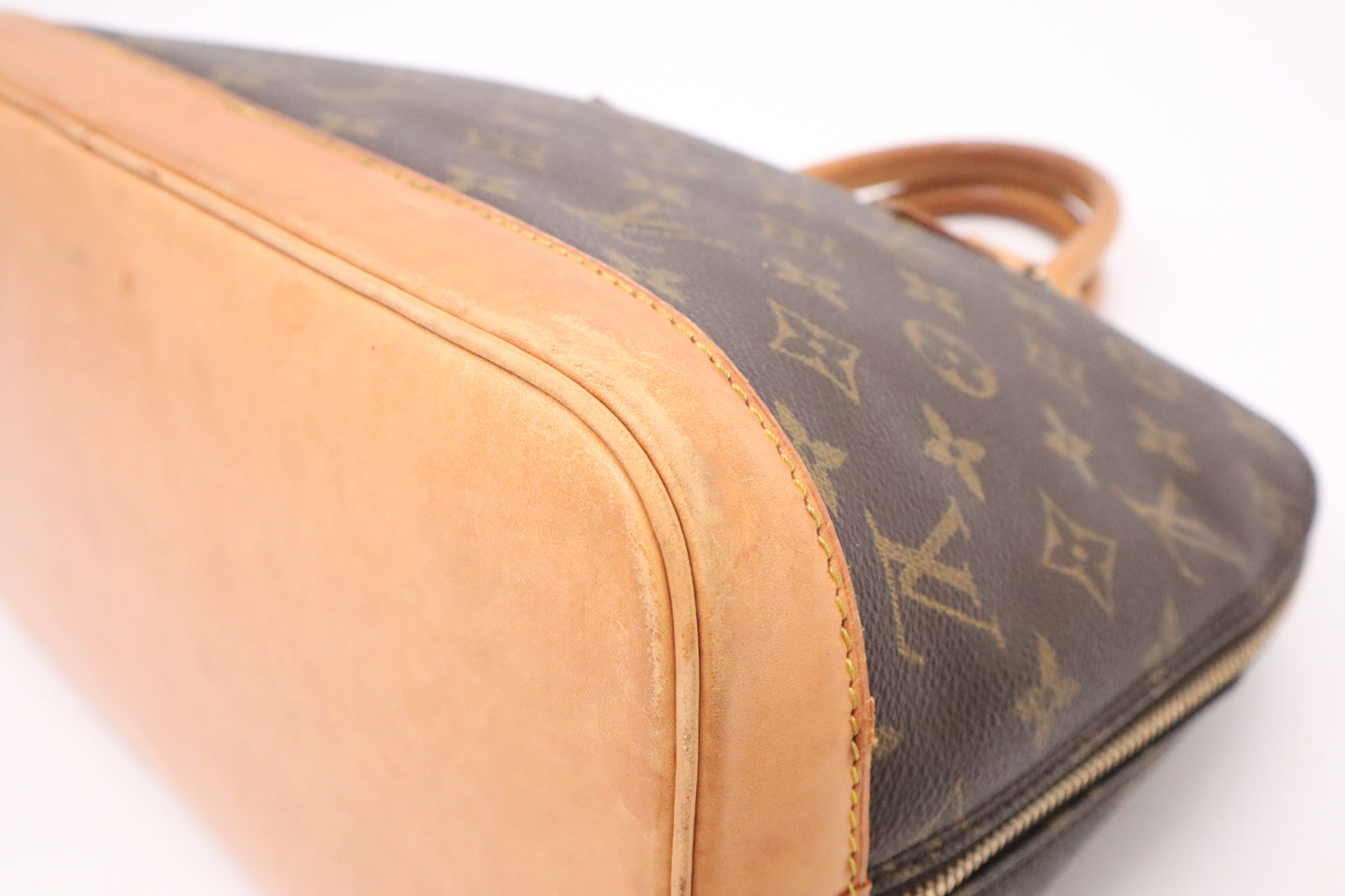 Louis Vuitton Alma PM in Monogram Canvas