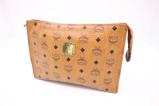 MCM Clutch Bag in Cognac Visetos Coated Canvas