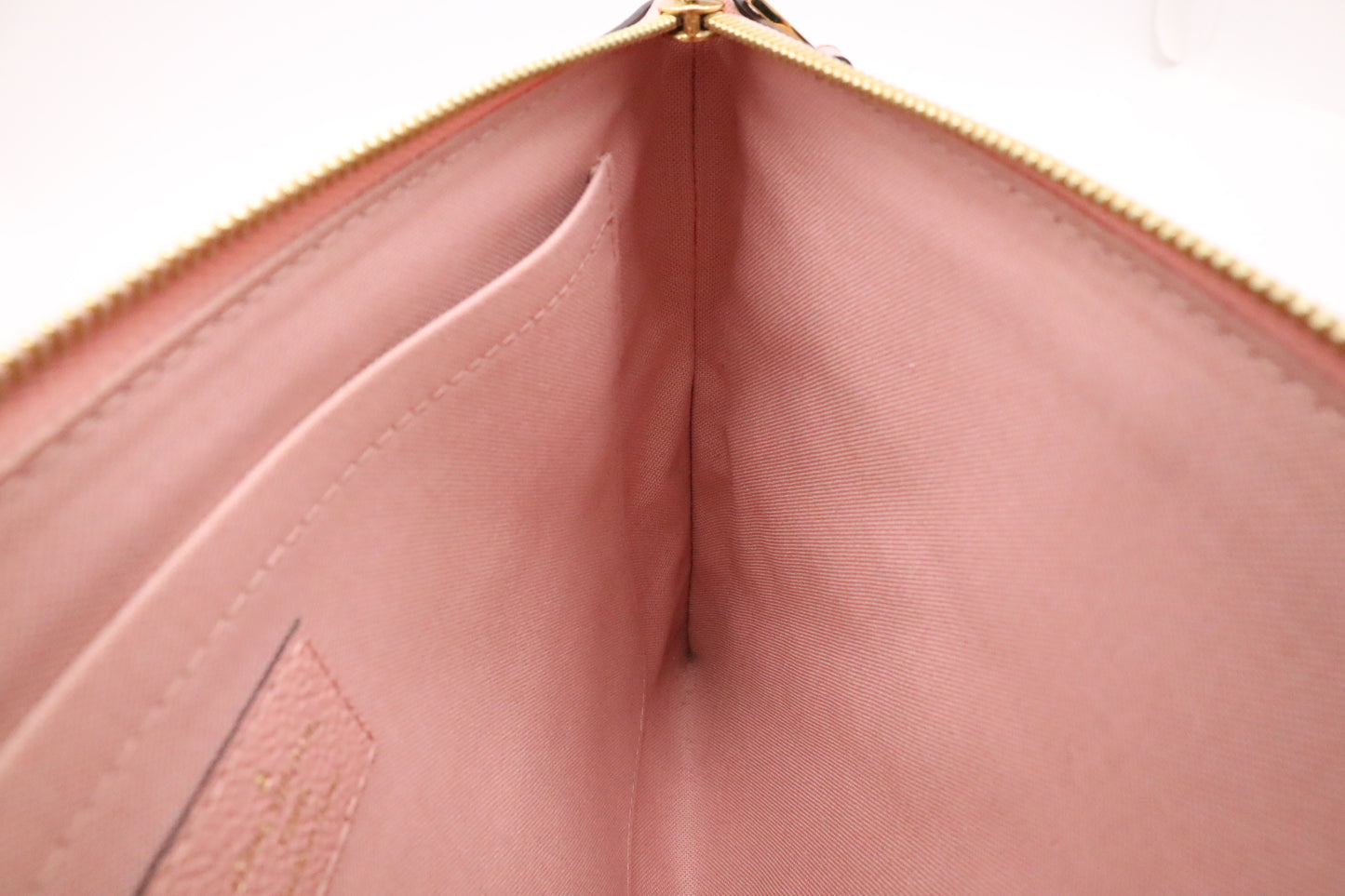 Louis Vuitton Daily Pouch in Pink Empreinte Leather