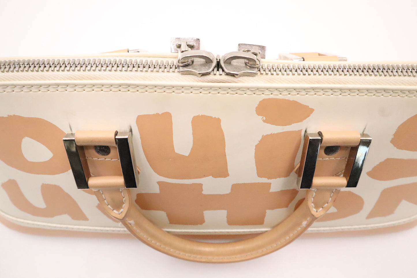 Louis Vuitton Alma in Cream and Beige Graffiti Canvas