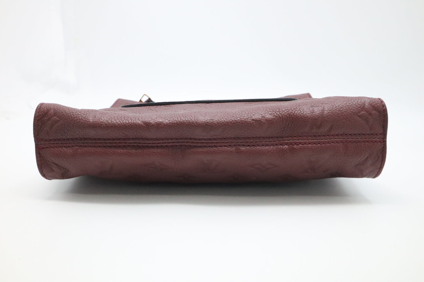 Louis Vuitton Petillante Clutch in Flamme Empreinte Leather