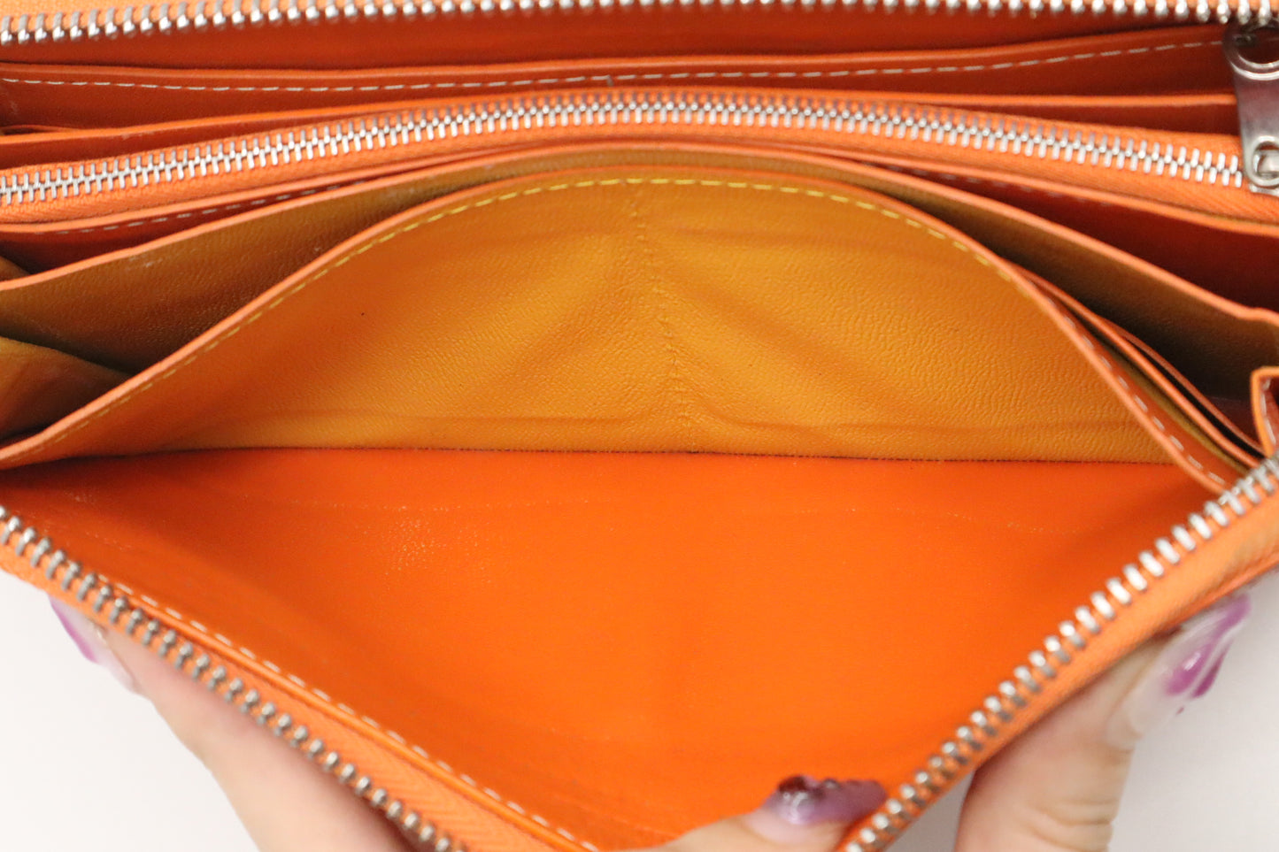 Goyard Long Zippy Wallet in Orange Goyardine Canvas