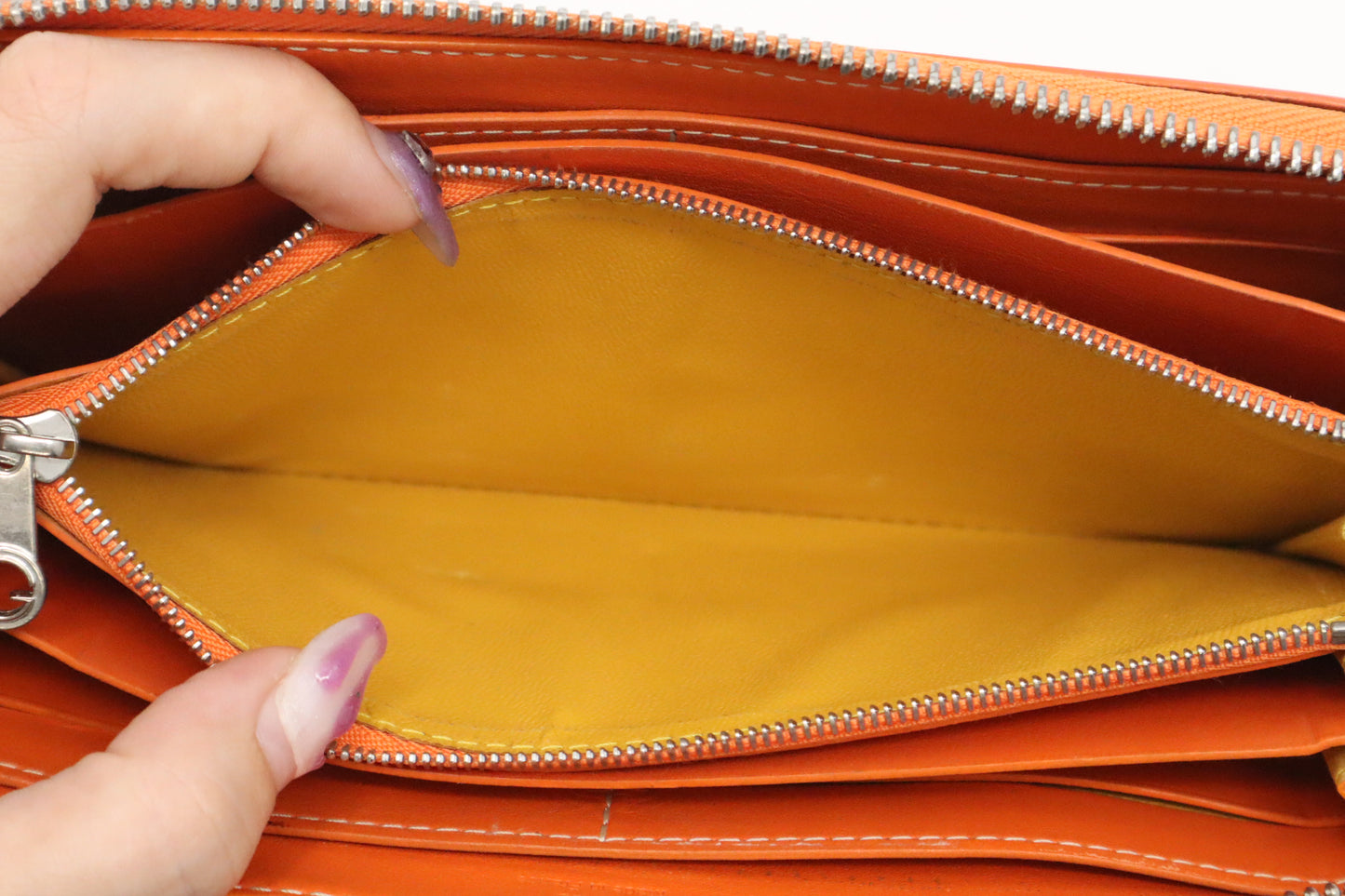 Goyard Long Zippy Wallet in Orange Goyardine Canvas