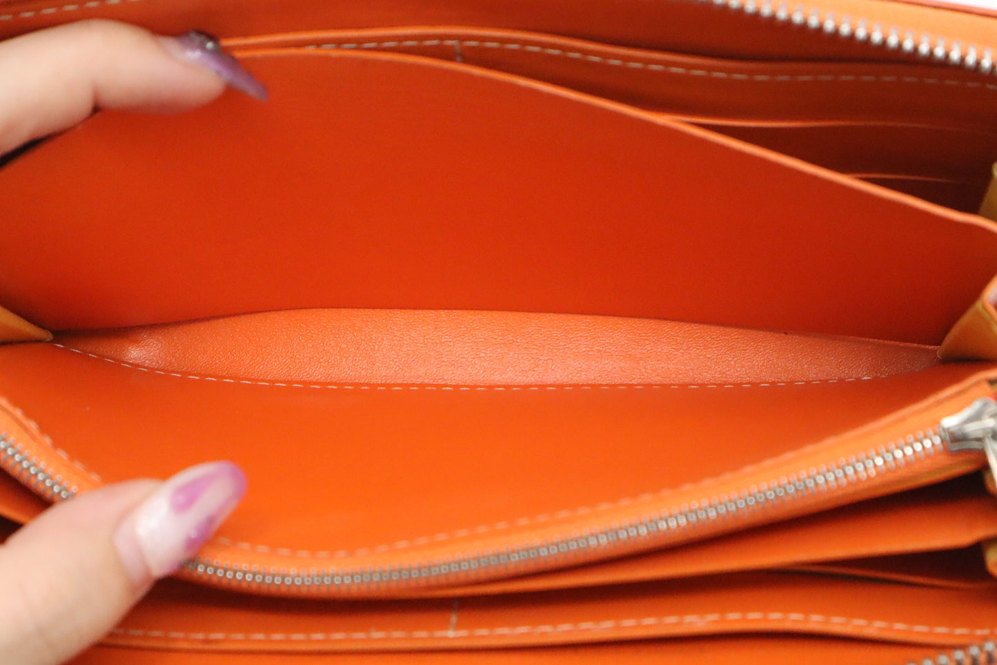 Goyard Long Zippy Wallet in Orange Goyardine Canvas
