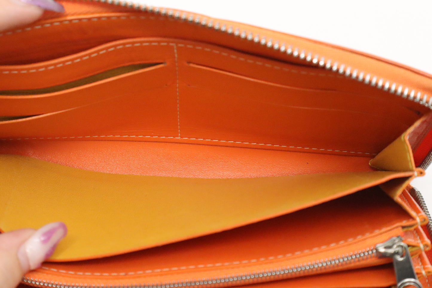 Goyard Long Zippy Wallet in Orange Goyardine Canvas