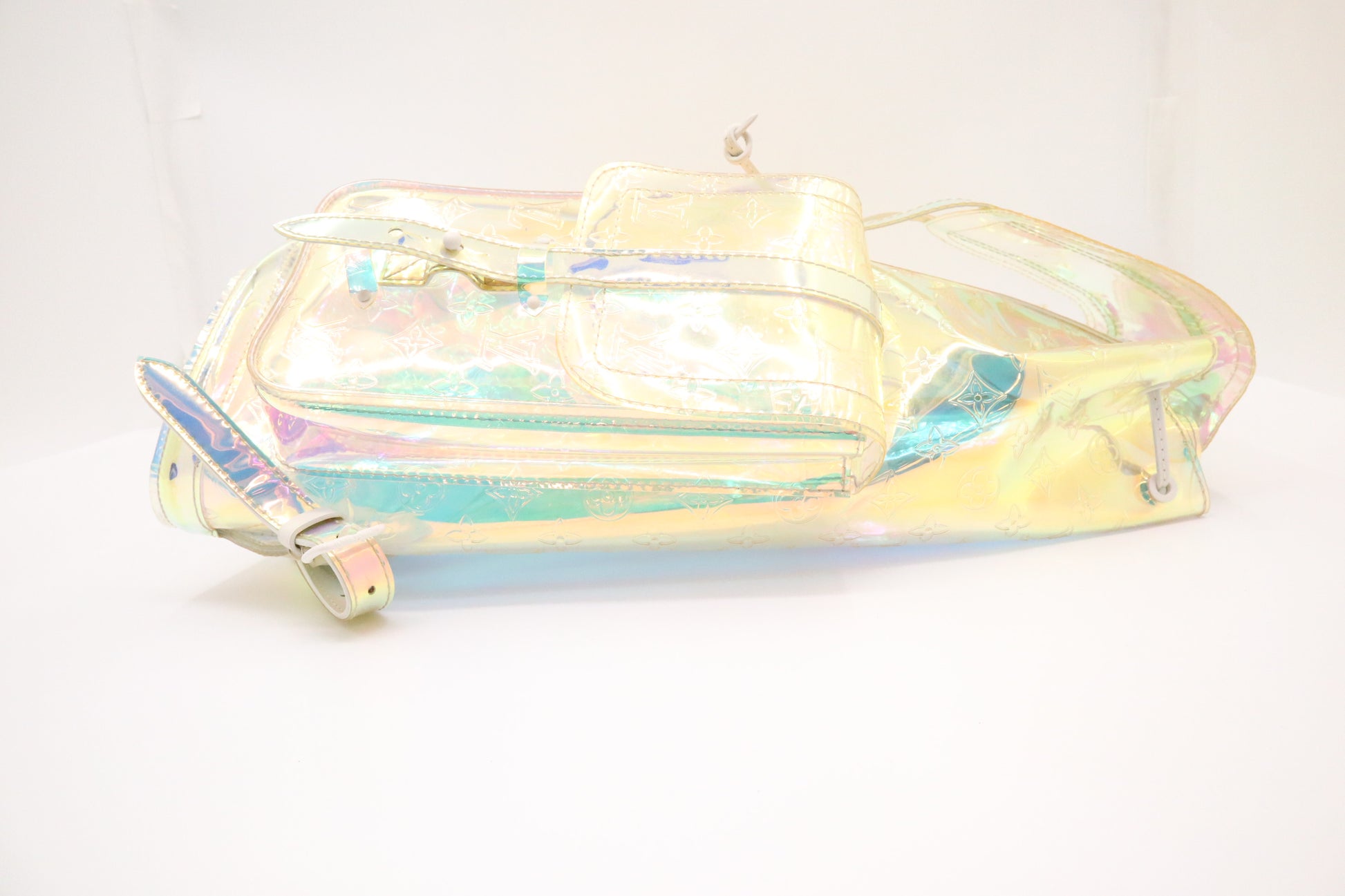 louis vuitton christopher backpack holographic - - PVC - Iridescent Prism - Virgil Abloh including a padded pocket that fits a 16 Louis Vuitton Silver Monogram Miroir
